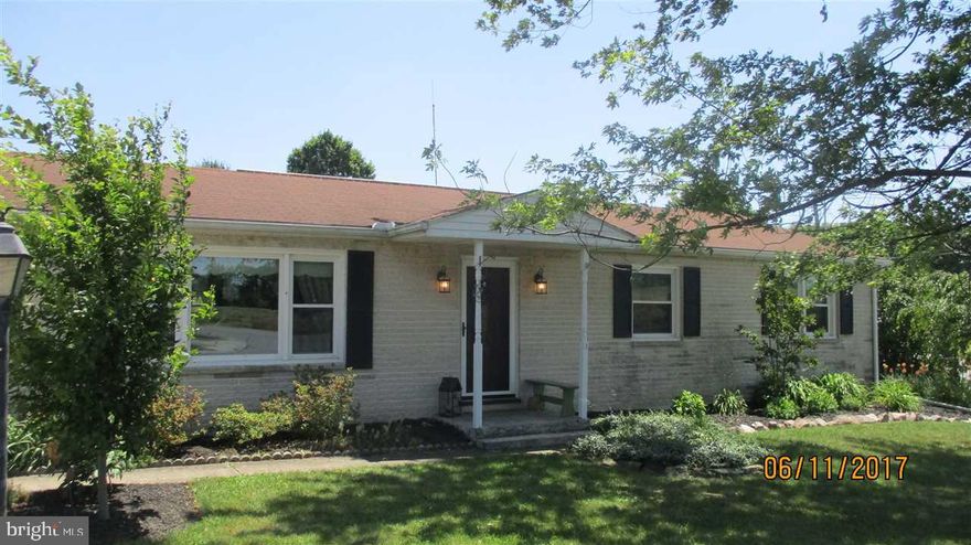 Country setting  surrounds this well maintained 3 bedroom 1 bath rancher in Spring Grove Schools. Corner lot beauty tucked beside rolling farmland and oozing with the feeling of serenity. Private backyard with patio. Combined kitchen/dining room with open feel. Hardwood floors throughout. Fireplace in Living Room. Bathroom with whirlpool tub, shower enclosure, granite vanity. Full basement with potential for family room/play room.1 car garage.