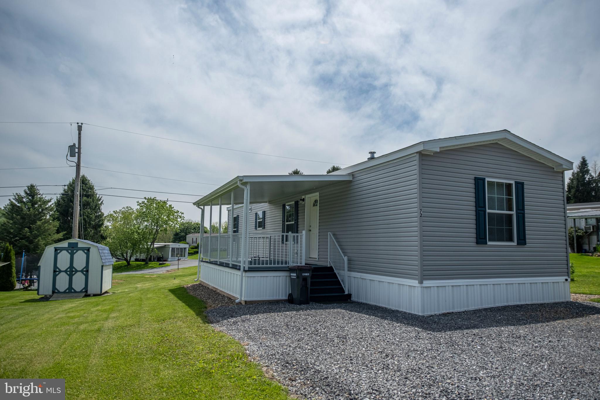 Welcome to this well-maintained 2-bedroom, 2-bathroom Eagle River home, located in the peaceful community of Continental Courts in Bellefonte. Built in 2022, this singlewide home offers modern comfort, energy efficiency, and convenient single-floor living. Step inside to find a spacious eat-in kitchen that opens to a cozy living room—perfect for entertaining or relaxing at the end of the day. The primary bedroom features an en suite full bath, while the second bedroom is located on the opposite end of the home for added privacy, with its own full bathroom nearby. Enjoy the outdoors from your covered front porch, ideal for morning coffee or evening unwinding. Additional features include a heat pump for efficient heating and cooling, and a 2.5-year-old shed providing extra storage space for tools, bikes, or hobbies.
Located just minutes from downtown Bellefonte, with easy access to shopping, dining, and local parks, this home offers both comfort and convenience in a well-kept neighborhood. Minutes from State College and University Park Airport. Don’t miss this opportunity—schedule your showing today!