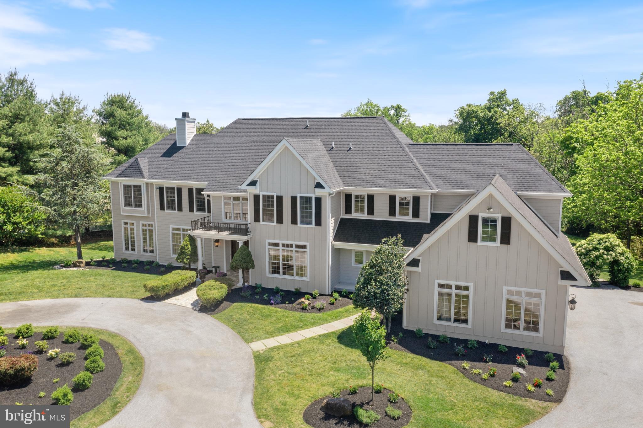 Nestled on a beautiful 2-acre lot in the award-winning Tredyffrin-Easttown School District, this magnificent traditional-style home boasts almost 6000 square feet of luxurious living space. With five spacious bedrooms, four full baths, and two half baths, this home is perfect for large families or those who love to entertain guests.
As you approach the property, you'll immediately notice the beautiful setting, surrounded by the natural beauty of mature trees and a lush lawn. The home is set back from the road, ensuring complete privacy and tranquility. The new Hardie-board siding and new roof create a beautiful exterior presentation that is further enhanced by the surrounding lovely gardens.
Step inside the grand foyer and be greeted by an abundance of natural light that fills the entire home, leading you to explore the exquisite features that make this home truly special. The first floor features a formal dining room that sets the stage for intimate gatherings or grand celebrations.
The custom kitchen with center island is perfect for preparing gourmet meals, or gathering for a quick bite. Adjacent to the kitchen is a spacious breakfast room with a cathedral ceiling. This peaceful spot leads to the huge deck with views of the expansive backyard, offering a tranquil setting for your morning coffee.
The home features a large living room with a gas fireplace and a connected sunroom which offers glorious natural light and stunning views of the surrounding nature. The private office is perfect for those who work from home, while the large family room with its high ceiling features a beautiful stone fireplace, perfect for cozy nights with family and friends.
Entertaining is made easy with the great floor plan, featuring an open concept design that seamlessly flows from room to room. From the family room, step out onto the expansive deck overlooking the backyard, providing the perfect setting for outdoor dining or simply taking in the peaceful surroundings.
The full unfinished basement with more than 2000 sf , 14 ft ceiling, roughed in plumbing, provides an incredible opportunity to create and add even more living space to suit your needs. With a slider walkout to the backyard, this space could be finished to create a beautiful recreation room, a home gym, or whatever your heart desires.
Head up to the second floor and discover the private retreat that awaits you. The spacious en-suite primary bedroom offers an attached private sitting room and a private under-cover porch, providing the perfect spot to unwind with a good book or simply take in the beautiful scenery. Dual walk-in closets provide ample storage space, while the luxurious primary bathroom features two separate vanities, a private water closet, a jacuzzi tub, and a glass stall shower.
As you walk down the hall past the laundry room, you'll find an ensuite guest bedroom that offers privacy and comfort for your guests. A hall bath serves two more spacious rooms, providing plenty of space for family and friends. At the end of the hall, a private suite bedroom offers the perfect retreat for a nanny, in-laws, or other family members who desire their own private living space.
With a beautiful 2-acre lot and neighboring protected grounds this property offers stunning views, privacy and endless possibilities for outdoor living. Whether you prefer to entertain guests or simply relax and unwind in a peaceful environment, this property offers ample space for creating your own personal sanctuary.
Located in the award-winning Tredyffrin-Easttown School District, this home offers the perfect opportunity to take advantage of the best education in the area. With its perfect combination of luxury, comfort, and functionality, and easy access to shops, dining and highways, this home is an oasis in the midst of a busy world.