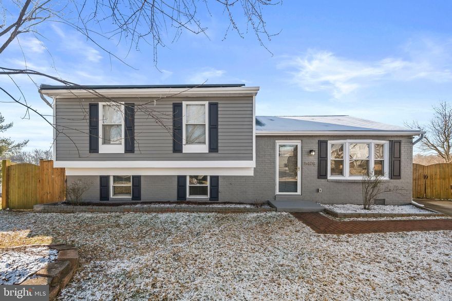 Turn-key perfection awaits! This stunning 4-bedroom, 3-bathroom split-level home has been fully renovated for modern living. The heart of the home is a gourmet kitchen featuring custom cabinetry and sleek stainless steel appliances. You will love the open main living area, highlighted by gleaming hardwood floors and a striking vaulted ceiling with an exposed beam. Each bathroom is a retreat, finished with stylish ceramic tile. Enjoy significant savings with the solar panel system designed for lower utility costs. Step outside to your private, fully fenced yard and relax on the adorable rear deck. Simply move in and start enjoying!