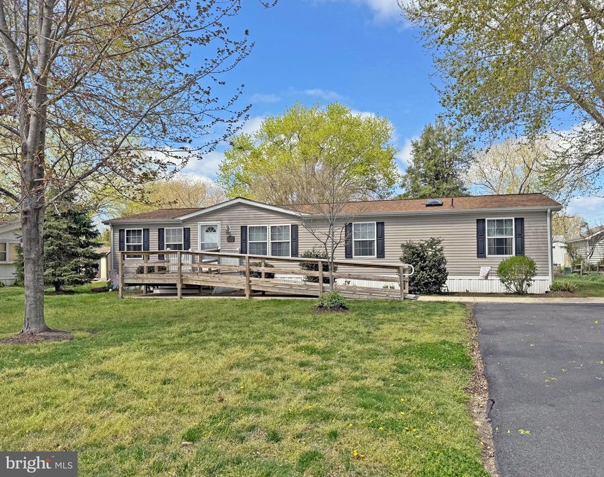 Nice location for boating/fishing enthusiasts. Located near the Oak Orchard marinas on the Indian River. And if you don’t want to join one of the marina clubs, DNREC’s Rosedale Beach and Massey’s Landing are nearby, too. This home is approximately 15 miles from the Lewes public beach and Rehoboth’s boardwalk and beach when you want a day in the sun, sand, and surf. And there are plenty of shops and restaurants nearby. This +1,600 sq. ft. home features a formal living room and a family room with a gas fireplace. Vaulted ceilings make the home feel even more spacious. The living room opens to the kitchen, which adjoins the dining area. There is a sliding glass door at the dining area out to the backyard. The spacious kitchen has an expansive breakfast-bar island with a countertop area for extra meal prep space and additional storage cabinets.  The black appliance package includes a gas range, built-in microwave, dishwasher, and a fridge with ice maker.  Popular split bedroom plan. The main bedroom is en Suite and has a walk-in closet. That bath features a double-sink vanity, a soaking tub, and a separate shower. The other two bedrooms and second full bath are off of the family room. The second bath has a tub/shower. Big laundry room with a full-size, side-by-side washer & dryer set. New roof in 2025. New water heater in 2026. HVAC has been routinely serviced, too. Public water and sewer. 10’x14’ Shed. Parking for +4 vehicles.