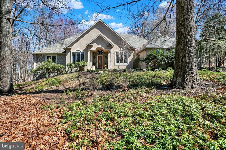 Exquisite Stone & Stucco Rancher… Welcome to this exceptional custom-built ranch home, quality craftsmanship by Zager Construction, recognized as the 1997 Parade of Homes "The Prestige Model." Nestled on a wooded 1.15-acre lot, this impressive residence offers a harmonious blend of elegant design, comfortable living, and exceptional outdoor amenities. Boasting 2,763 square feet of above-grade living space and an additional 1,706 square feet in the finished walk-out basement.
The main floor welcomes you with an open and airy floor plan, accentuated by soaring 12-foot ceilings. Travertine stone tile flooring flows seamlessly through the foyer, kitchen, hall, half bath, and mudroom. Beautiful hardwood floors grace the spacious living room, formal dining room, and hallway. The eat-in kitchen features stainless steel appliances including a double oven, built-in microwave and dishwasher, a convenient cooktop stove, a durable Corian sink and a pantry. Host elegant gatherings in the formal dining room, complete with a convenient Butler's pantry for seamless serving. A versatile den or potential 4th bedroom featuring a second Butler's pantry and elegant French doors. The inviting living room is bathed in natural light from three skylights and features a stunning stucco gas fireplace with a mantel, creating a cozy focal point. The private master bedroom offers a tranquil escape with a direct door leading to the sunroom. The ensuite full bath is a spa-like oasis, featuring a relaxing jet soaking tub, a stand-up shower with a seat and handrails, and a private commode with handrails for added convenience. On the opposite side of the home, you'll find two additional well-sized bedrooms and a shared full bathroom, providing comfortable accommodation for family or guests. Enjoy the indoor-outdoor living area of the delightful sunroom with hardwood floors, ceiling fan and 2 sets of sliding glass doors both with screen doors that can be accessed from both the eat-in kitchen and the master bedroom. The extremely large, finished walk-out basement nearly doubles the living space, offering endless possibilities for recreation and relaxation with full windows and French Doors that walk-out to the lower-level patio. This impressive lower level features a built-in bar with sink, a cozy gas fireplace, a full bathroom, three closets, and two large storage and utility areas. 
The rear of the property is an entertainer's dream. Step out onto the composite rear deck off the sunroom, complete with a motorized awning for shade on sunny days. An additional entertaining area awaits with a paver staircase leading to a charming Pergola over a spacious paver patio, featuring an inviting outdoor wood fireplace. Discover a serene large hand-dug pond with a tranquil waterfall, adding a touch of natural beauty to the landscape.
Additional Highlights:
 3-Car Side Entry Garage with an EV Charging Station
- Ample closet space throughout the home
- Central Vacuum system with an automatic dustpan inlet
- Gas fireplaces fueled by propane with an on-site system
- Private Well
- Trane heating and central air system
This exceptional property offers a rare opportunity to own a meticulously maintained and thoughtfully designed home in a desirable setting. Don't miss your chance to experience the unparalleled lifestyle this Stone & Stucco Sprawling Rancher has to offer.
Professional photos will be uploaded by Friday, March 28th