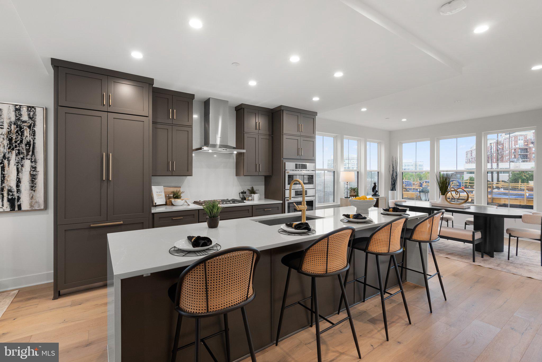 <p>Enjoy the spoils of new construction without the hassle of making design decisions or waiting for completion! Welcome to 1121 Polaris Road—a sun-drenched end-unit townhome completed in April 2025, blending elevated design with convenient access to the best of Park Potomac living. Built by award-winning EYA Homes, this coveted Edinburgh model boasts over $250,000 in luxe upgrades.</p>
<p>Spanning four spacious levels, with a private ELEVATOR each floor. Whether hosting guests, working from home, or accommodating long-term visitors, the accessible and flexible layout adapts beautifully to your lifestyle.</p>
<p>The main level stuns with windows on three sides, an upgraded linear gas fireplace with a sleek stone wall, and a dramatic waterfall-edge quartz island to anchor the gourmet kitchen—complete with top-of-the-line Bosch appliances, custom-paneled refrigerator and dishwasher, hidden outlets and a separate pantry. Step outside onto your private composite deck for morning coffee or to check the day's weather.</p>
<p>With four true bedrooms, each with access to a full bath, there’s space for everyone. The top-level 4th bedroom suite and lounge area are the perfect retreat for overnight guests, a second home office, gym, or bonus flex space.</p>
<p>And then there’s the rooftop - an expansive 265 SQ FT private terrace with Porcelain Pavers™ and skyline views—perfect for sunset soirées, summer dinners, or simply escaping the everyday. This is luxury outdoor living at its finest.</p>
<p>DUAL-zone HVAC, Rinnai TANKLESS water heater, fully wired for internet and WiFi. Garage prepped with EV rough-in, solar rough-in, and awning rough-in at rooftop. Builder Warranty in place.</p>
<p>Enjoy a vibrant lifestyle with Harris Teeter, Founding Farmers, Brooklyn's Deli, Walgreens, and more dining, cafes, boutiques, and everyday conveniences just moments away. Complimentary SHUTTLE to the Bethesda Metro makes commuting or city nights a breeze.</p>