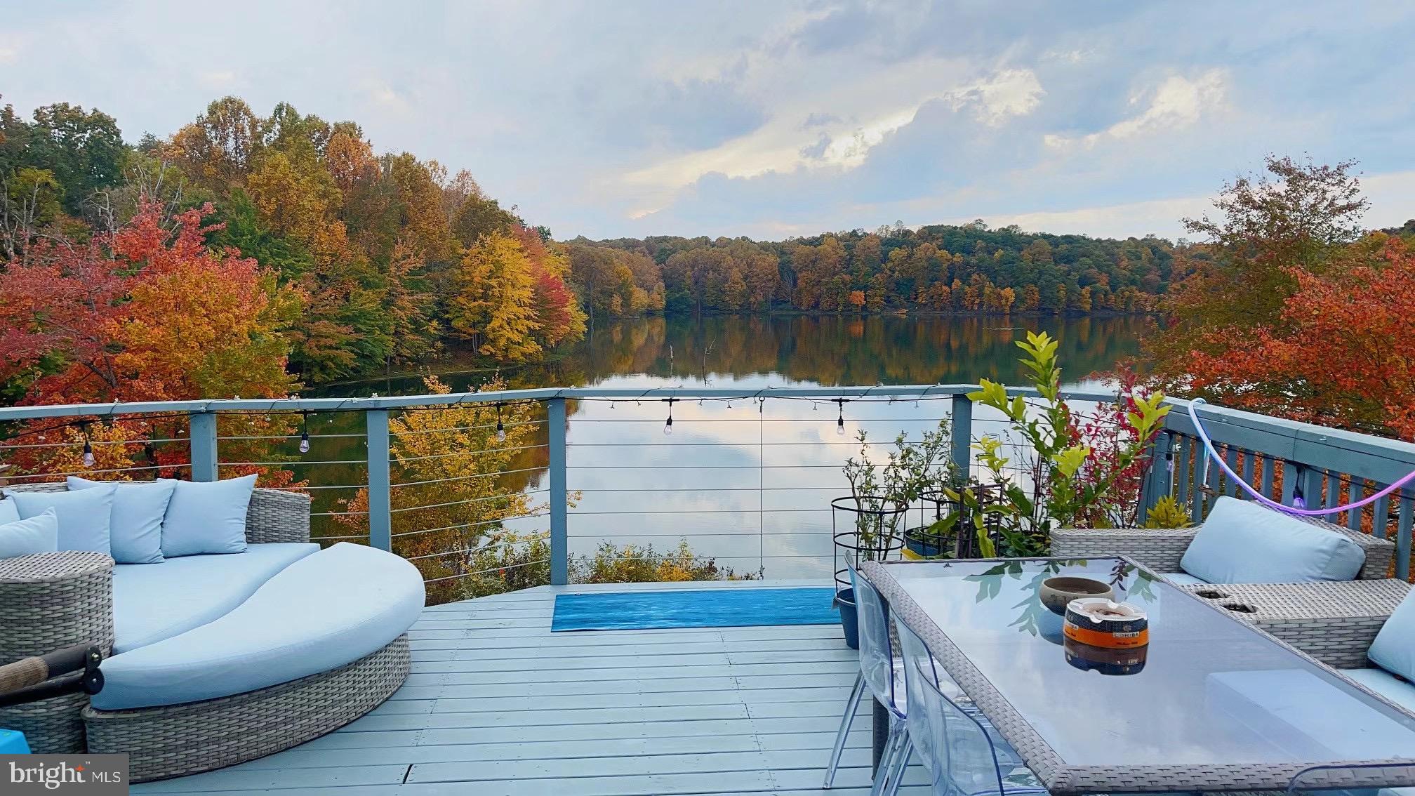 OPEN HOUSE SUNDAY 8/24 5:30-6:15PM
Unobstructed Million-Dollar Lake Views – End-Unit Townhome for Rent!
Welcome to your dream rental with uninterrupted, panoramic views of the Lake—no trees, no obstructions, just pure waterfront beauty right from your living room and back deck!
This gorgeous end-unit townhome is tucked away on a quiet cul-de-sac and features one of the best views in the area. With 3 spacious bedrooms, 3.5 fully updated bathrooms, and a double-sized deck directly overlooking the lake, this home offers luxury, serenity, and convenience all in one.
Inside, you’ll find new flooring throughout the entire home—no carpet, no stress, just clean, modern style from top to bottom. The bright and open main level features an airy open-concept living and dining area, perfect for entertaining or simply relaxing with the view. The kitchen includes an island, ample cabinet and counter space, and a cozy breakfast nook, with direct access to the expanded upper deck, where you'll enjoy front-row seats to spectacular lakefront sunsets and local wildlife.
Wake up each morning in the primary suite with a million-dollar lake view and an updated en-suite bathroom. Two additional bedrooms and another updated full bathroom complete the upper level.
The finished walk-out basement is a true bonus space, featuring a cozy wood-burning fireplace, a new luxury bar, an additional updated full bathroom, and access to the lower deck with built-in seating, leading to the scenic 1.3-mile trail around the lake. You’ll also find a brand new washer and dryer, a huge storage room, and two kayaks available for tenant use—perfect for spontaneous lake days right in your backyard!
Enjoy the best of outdoor living with Black Hill Regional Park just across the street, offering more trails, nature, and lake activities. All of this is just minutes from I-270, the MARC train, Wegmans, Clarksburg Outlets, and more.
Don’t miss your chance to rent a beautifully updated home with breathtaking views and unbeatable access to nature. Schedule your showing today!
