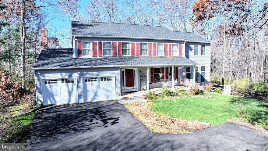 Distinctive and unique  one-of-a-kind home with two story addition surrounded by parkland!  A nature lovers and gardeners retreat.  5 BR with rare 3rd full bath upstairs.  Cul-de-sac setting. The addition is comprised of a gorgeous sunroom off the living room and above it, a 5th bedroom and 3rd full bath.  Office nook was formerly the laundry room and washer/dryer hookups remain.  Major kitchen renovation includes removal of wall between kitchen and former dining room creating large, open family room / kitchen space.  Wall of cabinetry was added,  plus double oven gas range, ample counter space -- a true gourmet kitchen!  And this opens to a large screened porch connected to the deck, all overlooking greenspace -- fantastic for entertaining.  Deck offers stairs to second lower level deck and yard with fire pit area.   Lower level finished rec room and large unfinished area has rear door to back yard.   Owners loved gardening, compost equipment can convey, and cisterns.  All freshly painted, hardwoods on main, new carpeting upstairs and down.   Two-zone HVAC and roof less than five years old.  Driveway and garage doors 2 years old. Washer/Dryer /Dishwasher less than 5 years old.