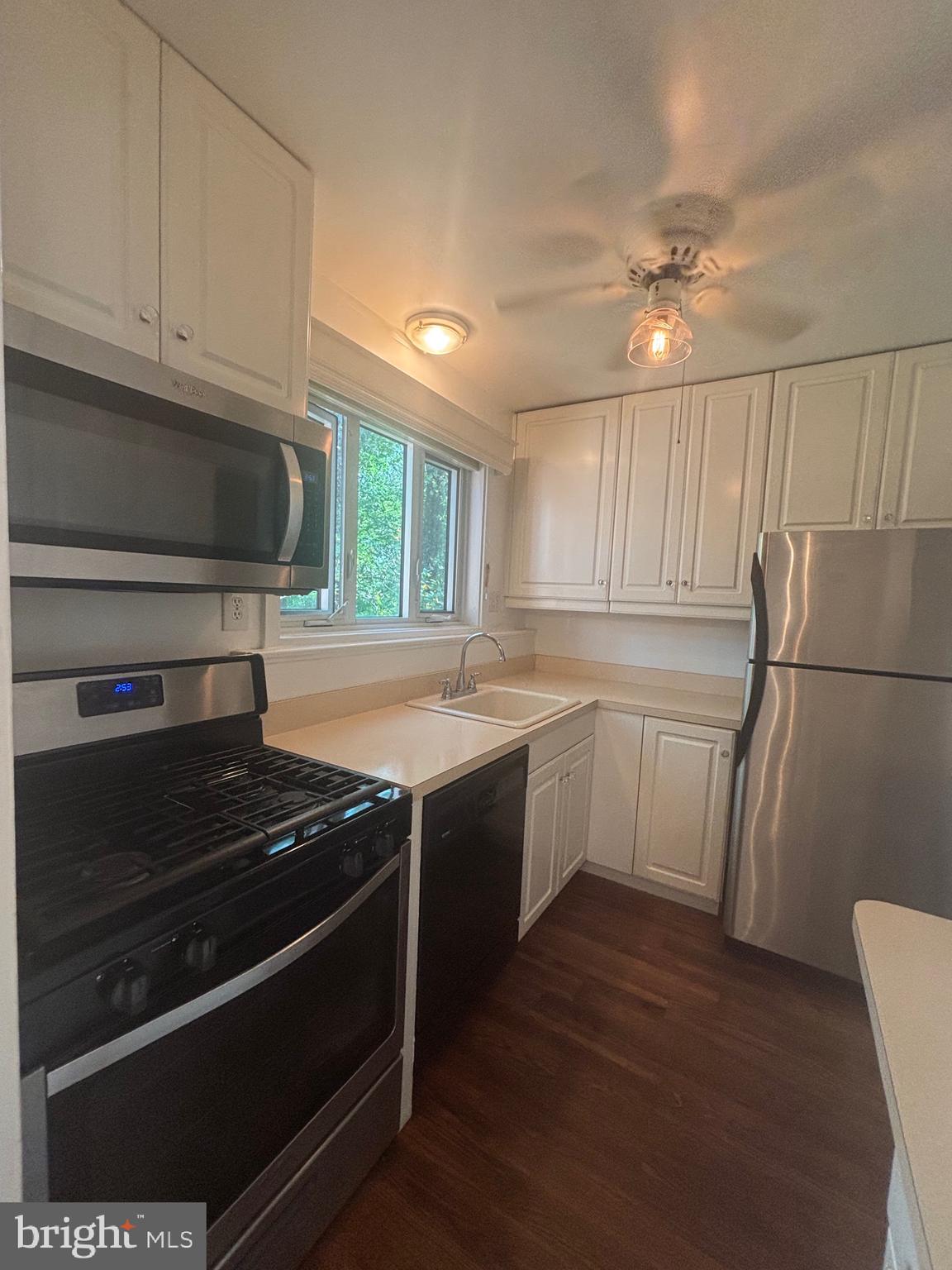 Another remarkable property brought to you by PRIME HOUSE PROPERTY MANAGEMENT! Welcome to your serene penthouse retreat! This beautifully updated 2-bedroom, 1-bath top-floor condo offers panoramic views of surrounding trees, parkland, and lush running and biking trails. Perched in a quiet, light-filled corner of the building, the unit boasts refinished hardwood floors throughout most of the home, with plush carpet in one bedroom for added comfort. The updated bathroom features a reglazed tub and clean, modern finishes.
Enjoy the peace of being steps away from the Strathmore Music Center while still having incredible access to the best of Montgomery County. Whole Foods, Pike & Rose, and downtown Bethesda and Rockville are all within minutes. Dine, shop, and unwind at nearby restaurants and nightlife hotspots just over a mile away at Pike & Rose.
 Commuter's dream: The Grosvenor-Strathmore Metro Station and local bus lines are just steps from your front door, offering a seamless ride into D.C. or throughout the DMV.
 Additional Highlights: