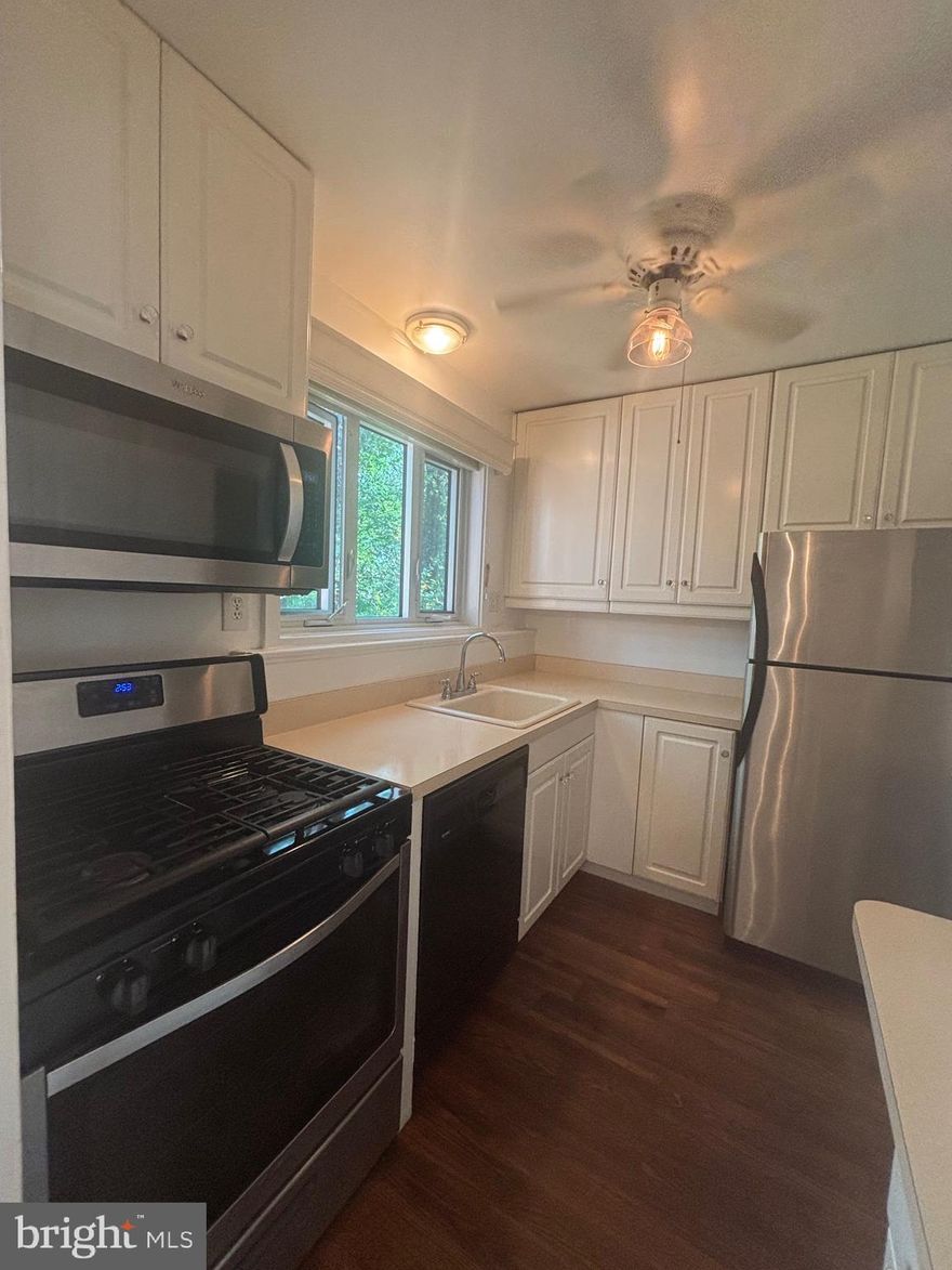 Another remarkable property brought to you by PRIME HOUSE PROPERTY MANAGEMENT! Welcome to your serene penthouse retreat! This beautifully updated 2-bedroom, 1-bath top-floor condo offers panoramic views of surrounding trees, parkland, and lush running and biking trails. Perched in a quiet, light-filled corner of the building, the unit boasts refinished hardwood floors throughout most of the home, with plush carpet in one bedroom for added comfort. The updated bathroom features a reglazed tub and clean, modern finishes.
Enjoy the peace of being steps away from the Strathmore Music Center while still having incredible access to the best of Montgomery County. Whole Foods, Pike & Rose, and downtown Bethesda and Rockville are all within minutes. Dine, shop, and unwind at nearby restaurants and nightlife hotspots just over a mile away at Pike & Rose.
 Commuter's dream: The Grosvenor-Strathmore Metro Station and local bus lines are just steps from your front door, offering a seamless ride into D.C. or throughout the DMV.
 Additional Highlights: