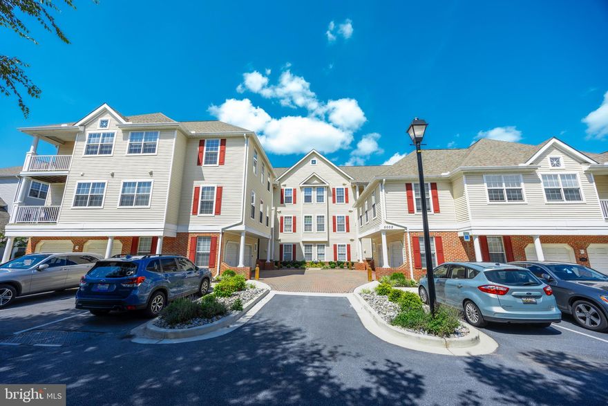 Welcome home to this beautifully maintained and light-filled condo offering a perfect blend of comfort, style, and functionality. Featuring an open-concept layout with soaring vaulted ceilings, this home is ideal for both relaxing and entertaining. Step into the spacious living area, where natural light floods through multiple windows, highlighting the cozy fireplace and elegant wood-style flooring. The neutral tones and designer touches create a warm and inviting atmosphere. A large sectional fits comfortably in the living space, perfect for gathering with family or friends. The kitchen offers plenty of counter space and cabinetry, along with a breakfast bar that opens to the dining area — making meal prep and serving seamless. The adjacent dining space flows nicely to a charming sunroom or patio access, adding even more room to enjoy and unwind. This condo also includes a dedicated laundry area, neatly tucked away behind double doors and equipped with a full-size washer and dryer, storage shelves, and cabinetry for added convenience. Additional highlights include: Vaulted ceilings for an airy, open feel, updated fixtures and stylish finishes, ample storage throughout, thoughtfully designed living spaces, located in a well-maintained community close to shopping, dining, and commuter routes, this condo checks all the boxes for modern, low-maintenance living. Don’t miss your chance to own this turnkey gem — schedule your showing today! HVAC and water heater we're both replaced in 2023.