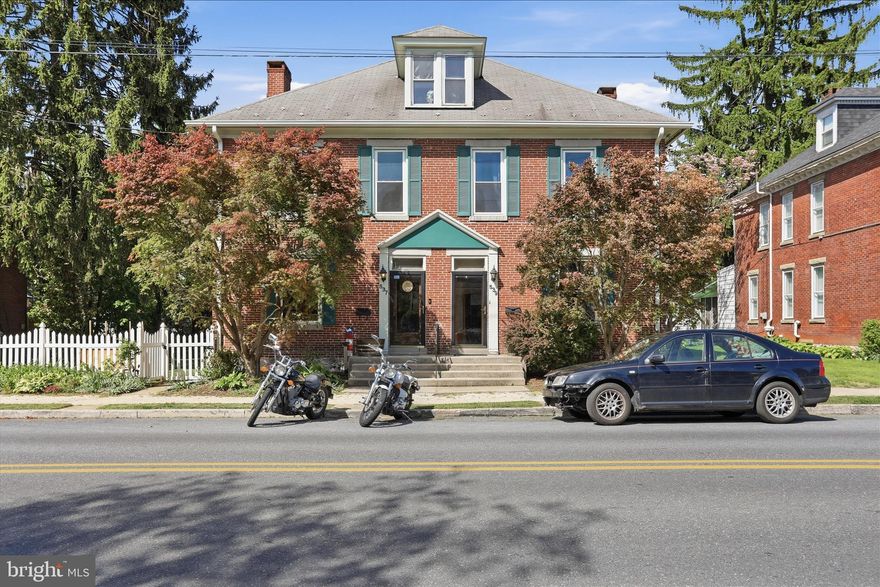Step into a world where timeless elegance meets modern sophistication in this stunning Victorian twin home, meticulously renovated in 2025. With a rich history dating back to 1919, this residence has been thoughtfully updated to blend its classic charm with contemporary comforts, creating a unique living experience that is both inviting and inspiring. As you enter, you are greeted by an expansive traditional floor plan, 11 foot ceilings, true hardwood floors, and expansive original woodwork that seamlessly connects the family room and combination kitchen and dining area, perfect for both intimate gatherings and grand celebrations. The eat-in kitchen is a culinary enthusiast's dream, featuring ample space for meal preparation and casual dining, all while basking in natural light that pours through the beautifully designed windows. With 4 generously sized bedrooms, and two full baths this half of the residence offers an abundance of space for relaxation and personalization, ensuring that every member of the household can find their own sanctuary.  Each detail has been carefully considered, from the craftsmanship of the cabinetry to the quality of the materials used throughout. Venture downstairs to discover a partially finished basement, complete with a connecting stairway and heated spaces, offering endless possibilities for customization-be it a home gym, entertainment area, or additional storage. Outside, the property sits on a spacious 0.28-acre lot, providing ample room for outdoor activities and gardening. The detached garage accommodates three vehicles, while the driveway offers additional parking for four or more, ensuring convenience for both residents and guests. The second half of the home features three large bedrooms and 1 and a half baths. Currently rented to a long-term tenant through May 2027. This home is not just a residence; it is a lifestyle. With its unique architectural features, including the classic brick exterior and Victorian detailing, this property stands as a testament to quality craftsmanship and design. Experience the perfect blend of historic charm and modern luxury-this is more than just a home; it's a place where memories are made and cherished for years to come. Don't miss the opportunity to make this exquisite property your own!