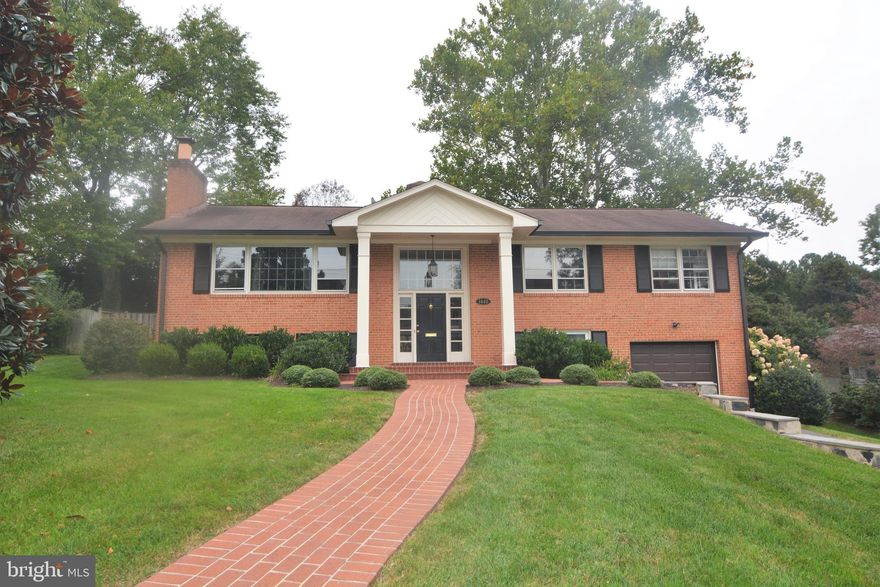 WOW! This gorgeous, all brick home is LOADED with amazing upgrades! Sizzling gourmet kitchen w/granite, six burner gas stove, 42" raised panel maple cabinetry, recessed lighting, stainless appliances, ceramic tile flooring & an island. Addition w/breakfast room & family room off of the kitchen. Gleaming hardwood floors,  crown & chair rail molding, French doors lead to large deck w/treed view.  Beautiful brick patio. Mature crepe myrtle, azaleas & hydrangeas.