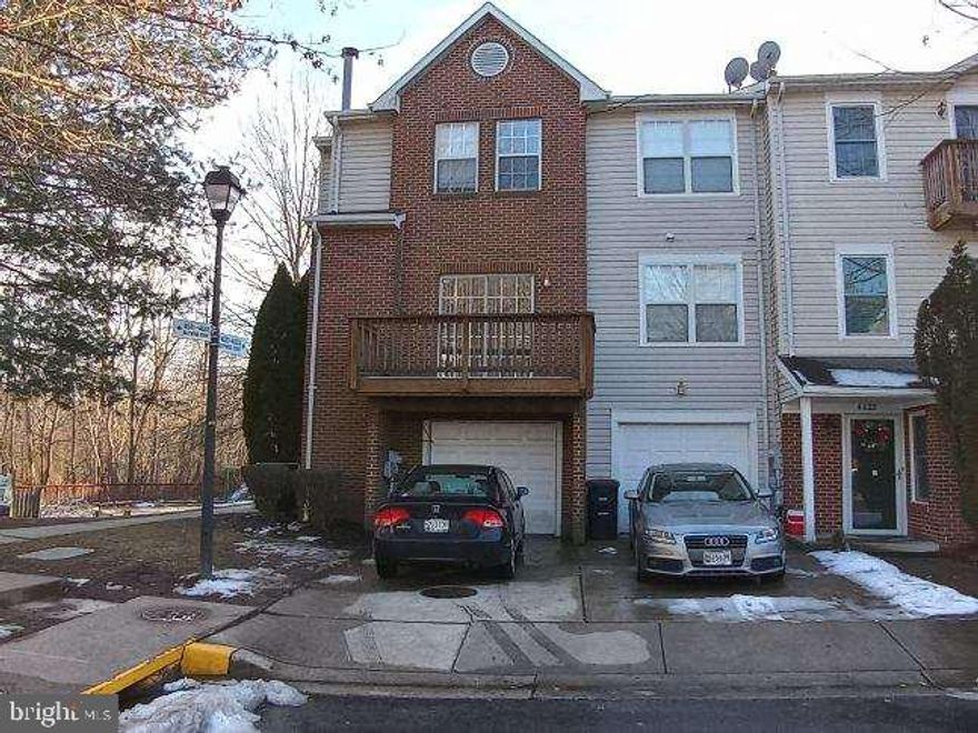 This GORGEOUS brick move-in ready 3 bedroom 2 & 1/2 bath end unit townhouse includes a garage and private driveway, with partial brick exterior.  Sits in lovely quiet cul-de-sac overlooking playground.  Main level includes living room (with fireplace), dining area, kitchen with nook for small table overlooking large window, 1/2 bath, laundry area, and sliding glass door that leads to a lovely deck.  Second Level includes 3 bedrooms, 2 full baths (master has private bath).  Plenty of closet space throughout home. Pool/Basketball courts. Close proximity to grocery stores, shops, malls, Route 50 & I95/I495.