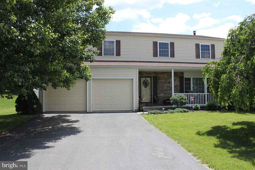 Inviting 4 Bd Rm 2.5 Ba home in very desirable neighborhood. Updated and improved over the years. CA, Furnace and HW heater all under 6 years old. Other Features include back yard vinyl fencing. Great for privacy or pets. Williamsburg brick patio, screened in porch, propane FP.  New carpet in LR, FR, up steps and in 2nd flr hallway. Fresh paint in 2 Ba Rms, 1st floor and Mstr Bd Rm. Cherry wood cabinets in Kit. HW cabinets Ba Rms.