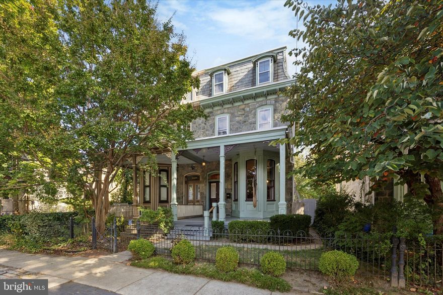 Welcome to 5027 Morris Street — a beautifully maintained, character-filled home that perfectly blends timeless charm with modern updates. Step inside to high ceilings, rich wood floors, and a stunning parquet vestibule that sets the tone for the warmth throughout. The sunlit living room features a beautiful bay window, while the dining room offers access to a classic back butler’s staircase. The kitchen impresses with green granite countertops, solid wood self-closing cabinetry, stainless steel appliances (including a new dishwasher), recessed lighting, and doors that open to a private rear deck—ideal for relaxing or entertaining.

Upstairs, you’ll find four spacious bedrooms, one accented with elegant French doors, and two beautifully updated full bathrooms. The second-floor bath features a claw-foot tub and a glass stall shower, while the main floor includes a stylish half bath for convenience. Generous closets are found throughout, and the finished basement provides abundant storage and extra living space.

Outside, enjoy a stately stone exterior, inviting front porch, and a newer rear deck offering peaceful privacy. Located on a great street with plenty of parking, this home is just steps from Fernhill Park—featuring tennis courts, a playground, and community events—and close to every kind of transportation imaginable. Easy access to Center City, Henry Avenue, I-76, and Route 1 makes commuting a breeze.

Meticulously cared for by its owners, this home radiates warmth, character, and pride of ownership — a truly special place to call home.