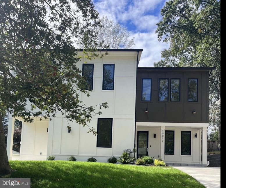 Welcome to 10012 Menlo Ave, a serene, inviting, newly constructed home on the tranquil street of Menlo Avenue located within the highly sought-after Capitol View Park of Silver Spring. A nearly 4000 sqft residence that is well designed, well built, and well finished. It is a showpiece of modern luxury with a rare quality level of construction.

Built by Progressive Builders, the home is designed with a unique focus on comfort and performance. It is engulfed in exterior insulation, from underneath the foundation to the exterior walls and even the roof. All windows and exterior doors are high end, energy efficient aluminum-clad. This home goes beyond construction code to achieve comfortable living and energy efficiency. Additionally, the home is electric vehicle charger ready.

As you enter, the welcoming foyer immediately opens to a sun filled open floor plan that flows effortlessly from one space to the next, the home is filled with natural light from oversized windows that frame serene views of the surrounding landscape. The expansive open floor plan, features high 10 foot ceilings, elegant Porcelanosa Spanish tiles, high-end designer finishes and lighting throughout. To the right, you are welcomed by a stately office space (optional bedroom). The foyer flows directly into the kitchen, dining, and spacious living area. The gourmet kitchen features a walk-in pantry, white quartz countertops, high end appliances, and European style cabinets with deep drawers to store all of your sauce pans. The large center island serves as a stylish and functional hub. Seamless transition into dining area and a spacious great room which features a gas fireplace and a coffee bar with beverage cooler.  The living area is connected to a beautiful rear patio through 12 foot wide French doors. Outside, the meticulously landscaped private backyard offers a tranquil escape with lush greenery, lighting, a lovely raised flowerbed. and a spacious patio for parties and gatherings.

Designed to accommodate multi-generational living, this residence offers distinct yet connected spaces that allow for both privacy and togetherness. As a huge bonus, the main level also includes a bonus in law-suite/attached ADU with its own entrance, featuring one bedroom, full bathroom, kitchenette, and laundry - ideal for aging parents, guests, or rental income to offset mortgage costs. 

The primary bedroom is located on the second level, and three spacious ensuite bedrooms. The primary suite includes a spa like bathroom featuring a free standing soaking tub and heated floor, a large walk-in closet, and a private balcony that offers the perfect escape for morning coffee or evening stargazing. Each bedroom is bright, airy, and designed to maximize both comfort and style. Each bathroom tells a unique story of beauty. A spacious family sitting area, and a laundry room complete the upper level.

Every detail, from construction materials, to the state-of-the-art finishes, has been thoughtfully chosen to create a home that not only meets but exceeds expectations.  With its perfect blend of comfort, modern amenities, and peaceful surroundings, this home stands as a sanctuary. The neighborhood is prized for its peaceful, tree-lined living, and a strong sense of community. With easy access to the Capitol Beltway, Forest Glen Metro Station, Kensington MARC Station, a walking distance to the metro bus, Capitol View - Homewood Park, walking and biking trails of Jones Mill Rd, nearby shops and Kensington Farmer's Market. A rare opportunity to own a custom-designed luxury home thoughtfully crafted for a quiet, peaceful, and tranquil homesite - welcome to 10012 Menlo Ave.