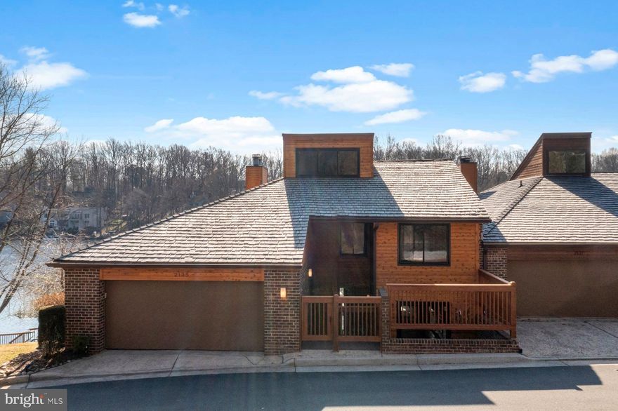 Welcome to 2135 Cabots Point Lane – A Stunning Lakeside Reston Retreat on Lake Audubon!

Experience waterfront living at its finest in this beautifully reimagined corner townhome on the serene shores of Lake Audubon. With extensive high-end upgrades and breathtaking views, this home offers an exceptional combination of modern luxury and lakeside tranquility.  

Recent upgrades include a fully remodeled primary suite with custom-built closets and a spa-like bathroom featuring heated Italian tile flooring and a walk-in shower. The open-concept main level is designed to maximize space and natural light, with a chef’s kitchen that includes heated tile floors, granite countertops, Thermador appliances, and a custom coffee/bar station with a built-in sink, filtered water, ice machine, and wine cooler.  

The walk-out lower level is perfect for entertaining, with heated tile floors, a built-in bar area with a sink and refrigerator, and sliding doors leading to a slate patio with direct lake access. Outdoor enhancements include a mosaic tile shower, all-weather ceiling fan, and space for a hot tub.  

This home has been updated with energy-efficient, triple-pane windows for enhanced insulation and comfort, a new cedar siding exterior (2024), and an advanced Trane variable-speed HVAC system with smart thermostat control. Additional features include a Mitsubishi split HVAC system for the upper floor, whole-home water purification, a central vacuum system, and two propane fireplaces.  

The expansive TimberTech wraparound deck (2024) provides a low-maintenance outdoor space with stunning lake views. Step down to your private dock for easy access to kayaking, paddleboarding, and boating.  

Located in a peaceful lakeside setting, this home is also just minutes from Reston’s best shopping, dining, and entertainment, including Reston Town Center, Metro access, parks, and trails.  

Don't miss this rare opportunity to own a luxurious waterfront retreat in one of Reston's most sought-after locations!