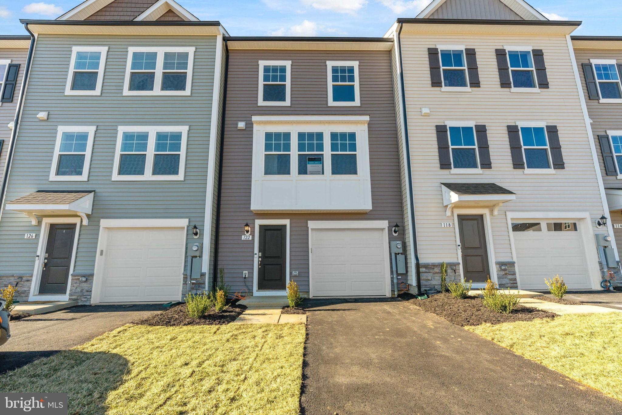 *PENDING RELEASE OF CURRENT CONTRACT*
Welcome to King's Crossing! The newest neighborhood in Charles Town, WV. This spacious interior row townhome offers 3 bedrooms, 3.5 bathrooms, 10x10 composite deck, and features an open floor plan as well as an LED lighting package. The well-appointed kitchen features an island, upgraded cabinets with Quartz countertops, stainless steel appliances, and much more. This home has a great space for a man cave, office, or rec/gaming room in the lower level. The primary suite features a tray ceiling, a walk-in closet and ensuite with dual sink vanity. Two secondary bedrooms, a full bathroom, and a conveniently located laundry area complete this floor.*Photos may not be of actual home. Photos may be of similar home/floorplan if home is under construction or if this is a base price listing. AGENT REGISTRATION REQUIRED.
