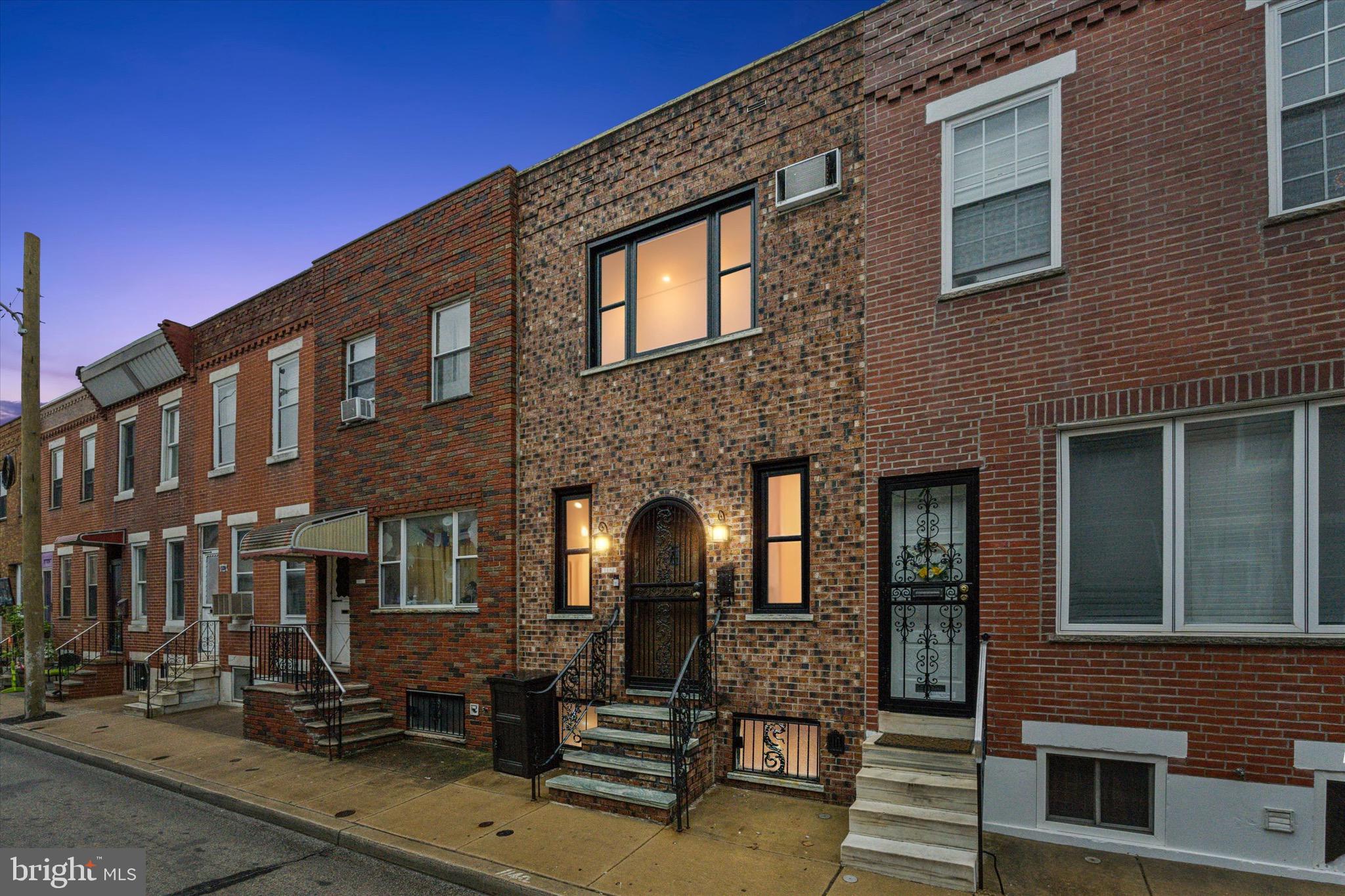 Welcome to this beautifully updated 2-bedroom, 1-bathroom rowhome located on one of the most desirable blocks in South Philadelphia! Thoughtfully renovated with character and charm, this home features an open-concept main floor with rich hardwood floors that flow seamlessly from the spacious living area into a stylish kitchen.
The kitchen stands out with exposed brick, exposed wood beam ceilings, and sliding glass doors that bring in an abundance of natural light and lead to a private rear patio—perfect for relaxing or entertaining. The home includes new windows, updated electrical throughout, and high ceilings in the basement offering excellent potential for finishing or added storage.
One of the home’s most unique touches is the castle-style front door that adds to its distinct curb appeal. Drop ceilings have been removed to open up the living spaces and enhance the overall sense of height and airiness.
This is a truly special home with the perfect blend of modern updates and timeless character—situated on a quiet, well-kept block with easy access to shops, restaurants, public transportation, and all that city living has to offer.
Don’t miss your chance to make this charming South Philly gem your own!
*The seller is offering a complimentary 1 year home warranty*