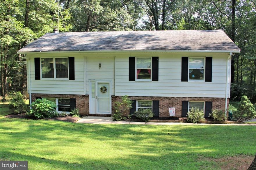 If you are looking for a private setting, this home is for you! 3 bedroom, 1.5 bath home on a large wooded lot with shed. Features family room with sliders to rear patio, large laundry and workshop rooms, playroom, and plenty of off street parking. Call today for your showing!