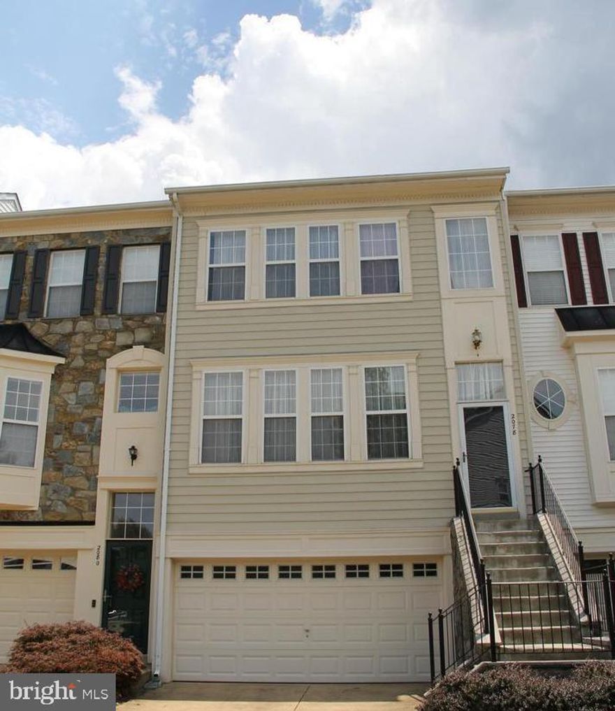 Great location, Wonderful large townhome, new paint, new carpet, walk to metro, two car garage. Ready to show.  Ready to move into. 3 levels, with a large kitchen with a family area adjacence, Another family room or bedroom on the lower level that walks out to the fenced rear yard. A full bath is also on the lower level.  Upper level has 2 full baths, the master has a soaking tub and a separate shower, plus a double vanity. Washer and dryer are also on the upper level.