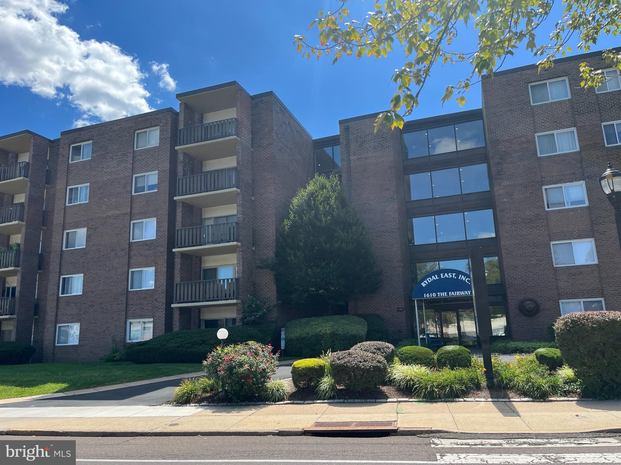 Welcome to 104 West at 1610 The Fairway in Jenkintown, Abington Township! This BEAUTIFUL first floor unit is completely updated and has the unique feature of direct access to the outside! Enter directly into the unit from the parking lot, through the private patio and sliding door vestibule. Or enter into the spotless and welcoming main lobby. There is carpeting and luxury vinyl flooring throughout the unit. The living and dining areas are open and spacious, with plenty of storage for all of your belongings. The kitchen has a convenient pass through from the main living area. Enjoy cooking in your fully updated kitchen, with granite counters, new appliances, and white cabinetry. The powder room is newly renovated and right off the main living area, easily accessed by guests. There are two spacious bedrooms as well. There is a wall closet in the guest room and a full walk-in closet in the light-filled primary bedroom. The primary bathroom has a tub/shower combination. There is a large laundry room on each floor and supplemental storage for each unit. Rydal East has beautiful grounds, with an abundance of outdoor seating and parking everywhere. There is an updated saltwater pool that sparkles in the summer sun! This is a coop. CASH ONLY. Buyers must receive board approval based on financial documentation. Listing agent must attend all showings. Monthly fee includes all utilities, taxes, insurance, trash, and maintenance fees!