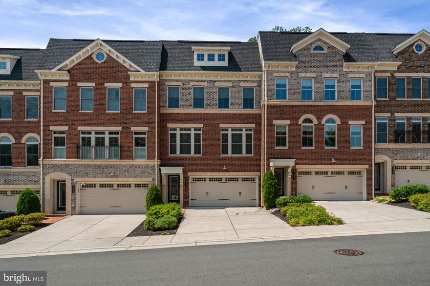 ***OPEN HOUSE CANCELED***Home is Under Contract***A calming oasis in Falls Church – this 3 level townhome on a premier lot backs to open space.  Double French doors lead to a large deck with retractable awning where you can leave your cares behind. Inside, the open floor plan includes a great room with gas fireplace, custom built-ins, a large kitchen island, high end cabinetry, walk-in pantry and room for 4-5 bar stools that allow for great entertaining.  A separate dining room provides ample space for family or formal dining. The main and upper levels boast hardwood flooring and 9’ ceilings. The upper level includes the master suite with a soaking tub and shower, and 2 other generous bedrooms. The lower level is an open area made for that massive TV screen and includes walk-in storage space and a walk-out to a fenced patio and garden.  The lower level can also easily be converted into a 4th bedroom.  The home includes 3 1/2 baths, a two-car garage and an upper-level laundry room. Come view this well-appointed townhome close to Route 66, Route 7, the East Falls Church Metro and all your favorite restaurants, stores and more.