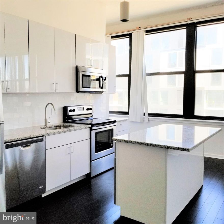 Renovated 1-Bedroom/1-Bathroom Loft at The Marine Club in South Philadelphia! Conveniently located at Broad and Washington, you will have easy access to shopping, dining, public transportation, and some of the best entertainment Philadelphia has to offer. This stunning condo will be available in mid-December and we are accepting applications NOW!

This spacious loft features a full kitchen with stainless steel appliances, island with overhanging countertop for barstool seating, granite countertops, custom white cabinets, and subway tile backsplash!

The large windows provide tons of natural light in the dining room and living room and make both spaces feel incredibly open and spacious!

This loft comes complete with all the modern necessities including central air and washer/dryer. Building includes a 24-hour concierge, health and fitness center, and community courtyard that is a great getaway right at home!

The easy access to shopping and public transportation make this location absolutely perfect! Directly across the street is a Sprouts grocery store and Target which will make shopping a breeze. The Broad Street subway line is steps away and if you have a vehicle or bike, you can get to many different neighborhoods in the city by quickly hopping on Broad Street or Washington Ave!

There is a $30.00 water usage fee due in addition to rent each month. Tenants are also responsible for electric, gas, and internet/cable. Small pets welcome with additional deposit! Parking may be available with the building at additional cost.

*Tenant is responsible for any move-in fees or elevator reservation fees due to condo association.*

Application Qualifications: Minimum monthly income is 3 times the tenant’s portion of the monthly rent, acceptable rental history, acceptable credit history and acceptable criminal history. More specific information provided with the application.