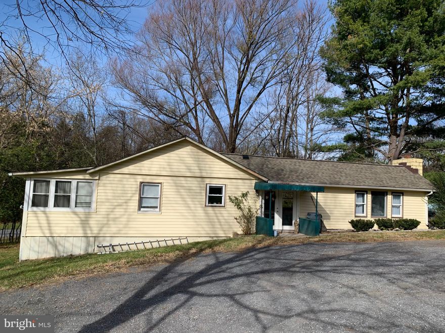 Charming rambler on 1/2 acre corner lot in Shenandoah Shores.  This 2-bedroom home features a bonus sun room with a separate entrance as well as a large cement patio and wood deck,  main-floor laundry, and a shed.  Many updates are already in place, including new roof with gutter guards (2020), HVAC (2016), and septic D-box replacement (2021).  With your own finishing touches and cosmetic updates you could make this house shine!  
Walking distance to the river and a short drive into the town of Front Royal, this location can't be beat.  Come see it before it's gone!