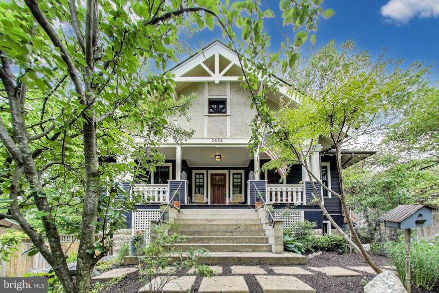 Welcome to 2332 N Tuckahoe Street, a rare opportunity to own a true piece of Arlington history and architectural innovation. Originally constructed in 1929 as a Sears Elsmore kit home, this 5-bedroom, 4-bathroom Craftsman has been thoughtfully expanded and updated to maintain its historic charm —all in the heart of the sought-after Berkshire Oakwood neighborhood.  
Nestled in a quiet, tree-lined, beautifully landscaped lot, this charming Craftsman home blends timeless architectural detail with modern functionality. Inside, you'll find a blend of preserved historical character and fresh, modern touches. The main level showcases the hallmark features of Craftsman style, including rich wood accents, 9 ft ceilings, and a cozy living area that flows seamlessly with the dining space. Natural hardwood floors, a wood burning fireplace, and a main level-suite make the main level ideal for both entertaining and everyday comfort. A modern staircase with minimalist wrought-iron railing adds a contemporary design element, tastefully integrated into the original layout with lots of windows allowing natural light to shine through. Designed with thoughtful separation of space, all bedrooms are situated in the fully finished lower level, providing privacy, quiet, and natural temperature regulation year-round complemented by the radiant heated flooring. The highlight of the lower level is the spacious primary suite, which features a generous walk-in closet, a luxurious ensuite bathroom, and direct access to its own private oasis—a patio perfect for morning coffee or a serene evening retreat. This home offers the perfect balance of classic character and modern livability, with the unique bonus of a walk-out bedroom sanctuary.

A major renovation in 2009 added a new concrete foundation, a rear addition, new windows, a finished walkout lower level and zoned climate control for each level of the home. The home now features over 3,000 finished square feet across three spacious levels—all while preserving key architectural elements, including the original hip roof line and signature Craftsman details like wooden colonnades, hardwood window trims, and the original hardwood floors.

Additional highlights include driveway parking, updated systems and appliances, and proximity to everything Arlington has to offer. You’re just moments from Westover Village, East Falls Church Metro, parks, shops, restaurants, and neighborhood favorites like the Charles A. Stewart and Tuckahoe Parks. Part of the Yorktown school pyramid this location is a dream for commuters and families alike.

Homes like this rarely come to market. With its blend of historical pedigree, modern functionality, and unbeatable location, 2332 N Tuckahoe St is the Craftsman you've been waiting for.