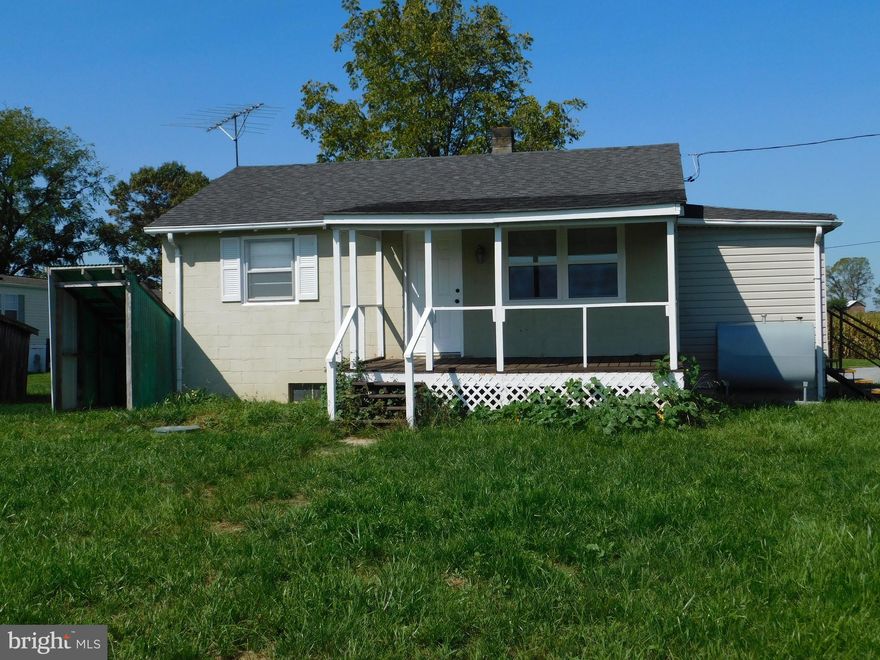 2 bedroom, 1 bath detached, single family house - recently renovated!  Features include NEW LVP flooring, cabinets, counter tops, hardware and lighting!  Kitchen features NEW SS appliances - range, range hood, refrigerator and dishwasher.  New tub with surround and large vanity in the bathroom.  Pastoral and mountain views!  Mud room entrance into kitchen/living room as well as covered front porch.  Storage and washer/dryer hookups in the basement - exterior access only.   Oil heat, well and septic.  Located approximately 1/2 mile off of hard surface road on gravel lane.  1 small pet MAY be considered with approved application, pet deposit and pet rent - type, breed and size restrictions apply.  Tenant is required to obtain renters insurance.  No Smoking/Vaping.  Lawn maintenance is included in the rent.   Tenant has access to yard/area around the house only - not the entire property.  Property is located in Jefferson County, WV but has VA mailing address. Tenants advised to contact school board for confirmation.  SF and year built are estimated