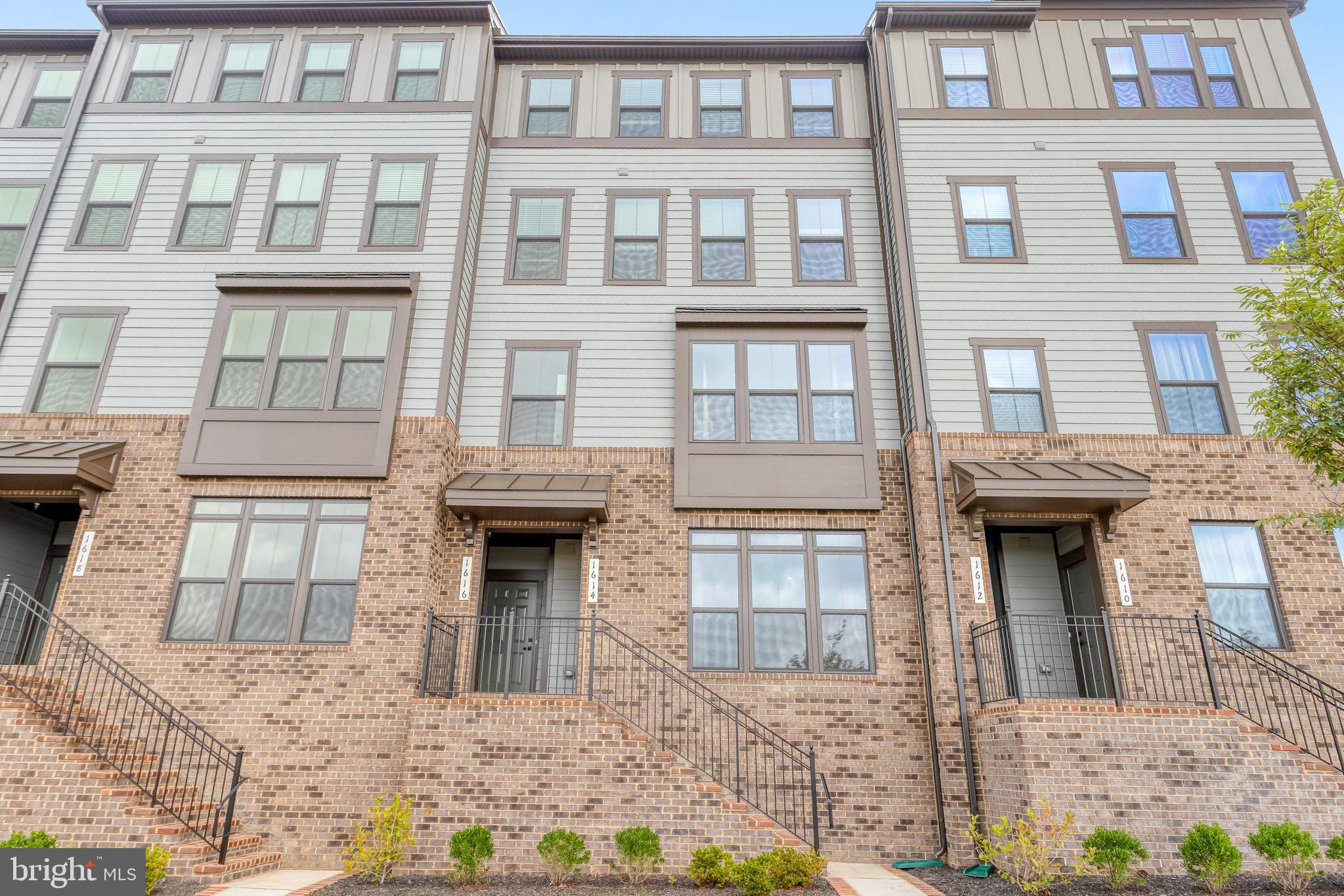 Military Discount Available! Welcome to this beautifully built 3-bedroom, 2.5-bath townhouse-style condo in the vibrant, amenity-rich Potomac Shores community. Enjoy stunning views of the Potomac River from your private balcony and a modern, open-concept layout featuring quartz countertops, stainless steel appliances, hard surface flooring, and ceramic-tiled bathrooms. Smart home technology enhances your daily living experience, while a private 1-car garage with an EV charging station adds convenience for eco-conscious drivers. Exterior and lawn maintenance are included, making for easy, low-maintenance living.
As a resident, you'll have access to resort-style amenities including multiple pools, a fitness center, 1 Gig Verizon FiOS internet, water, sewer, trash and recycle services included with the rent. The community offers over 10 miles of scenic trails, a canoe launch, fishing pier, Tidewater Grill, Jack Nicklaus Signature Golf Course, Ali Krieger Sports Complex, and courts for tennis, pickleball, and basketball. Families will appreciate the playgrounds, community greenhouse, and frequent social events. Plus, enjoy future access to the VRE Station just a minute’s walk away, along with a new boardwalk, marketplace, and central park. Located just 30 miles from D.C., with easy access to Ft. Belvoir, Quantico, The Pentagon, The Rose Entertainment Center, and Potomac Town Center.