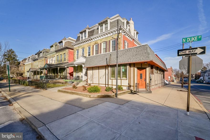 Exceptional mixed-use opportunity in the heart of Lancaster City. 

This well-maintained 4792 sq ft corner property offers unmatched flexibility, visibility, and income potential. Ideal for an owner-occupant, investor, or business seeking a high-profile location, the property includes a beautifully updated first-floor unit with many options for use, plus 2 additional apartments.

Main Level-Newly Renovated Office/Residential Suite
*Brand new kitchen with modern finishes
*New full bathroom plus two half baths
*Dedicated spa tub room
*Electric fireplace
*In-unit laundry
*Handicap accessible
*Private, fully enclosed outdoor patio
*Direct access to 8 on-site parking spaces (rare for Lancaster City)
*All appliances included.

Residential Units 
*Unit 1-Two-Bedroom, one-bathroom apartment
*Spacious layout with a working wood-burning fireplace
*In-unit laundry and all appliances included.
*Strong rental potential

*Unit 2-One-Bedroom, one bathroom apartment 
*Bright and open with a second-story private balcony
* In-unit laundry, and all appliances included.
*Ideal for both long-term and short-term rentals.

Additional highlights include:
*Total building size 4792 
* Corner lot with high visibility and strong traffic exposure
* All Appliances Included in each unit, making for easy, move-in ready living.
* Washer/Dryer included in each unit.
* Updated mechanicals and modern finishes throughout
*Ample parking and outdoor space
*Minutes from downtown Lancaster, LGH, and major commuter routes

This is a rare chance to own a turnkey, income-producing property with exceptional versatility and premium upgrades. Whether you’re looking to live in one unit and rent out the others, or seeking a solid addition to your investment portfolio, this property offers an incredible value with steady income potential and a prime location.