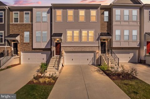 Photo of 15032 Jaxton Square Lane, HAYMARKET, VA 20169 (MLS # VAPW2117910)