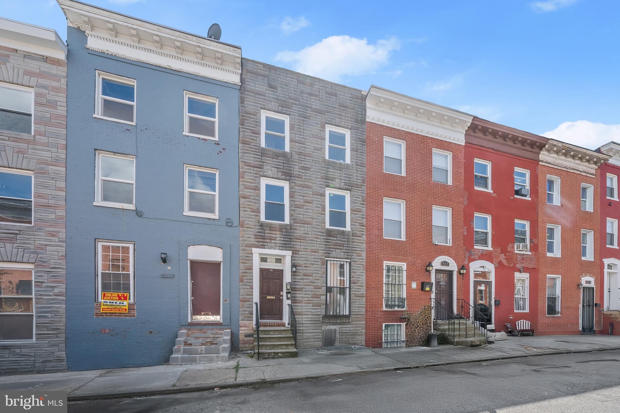 This renovated two-unit row home offers a practical opportunity for investors or owner-occupants seeking steady rental income or shared living potential. Each unit has its private entrance and spans two levels, providing a townhome-style layout with functional updates throughout. Both apartments feature two bedrooms, a full bathroom, a kitchen, and in-unit laundry facilities. The interiors feature a neutral color palette and new flooring, with updated kitchens including stainless steel appliances. Energy-efficient heating and cooling systems help keep operating costs down, and water service is included. Conveniently located near public transit with easy access to downtown and major highways, this property presents a solid investment option in an area with consistent rental demand. Whether you're building a portfolio or seeking a live-in/rent-one-out setup, this duplex is move-in ready and offers straightforward utility. Note: Select interior photos have been virtually staged.