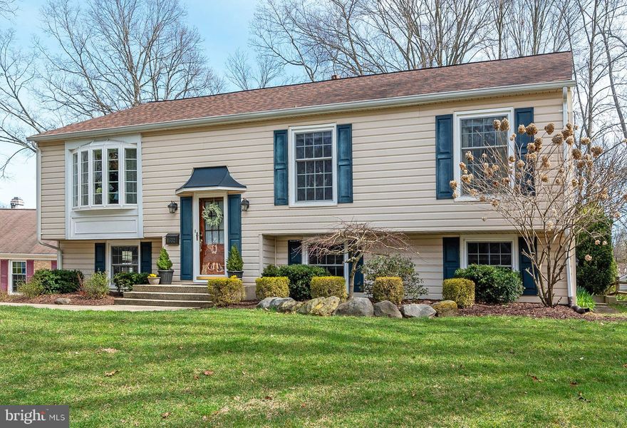 Nestled in the heart of Eton Way: lovely addition offers beautiful remodeled and expanded master bathroom with heated flooring, large walk-in closet and mud room, accessed from the deck * gleaming hardwood flooring * updated kitchen has Cherry cabinets, granite counters, stainless steel appliances including gourmet-style dual fuel Viking range, wall removed to open Kitchen-Dining Room space * Remodeled hall bathroom has longer soaking tub than builder installed * Savor morning coffee from screened-in porch with Ipe flooring and vaulted ceiling * Storage under screened porch * Finished Lower Level offers 2 BD, full BA, ceramic flooring, fireplace & bar area * New Roof on main body of home (2023) * Vinyl siding * Chimney repointed * Updated/upgraded electrical panel box * Great location for commuting to: Annapolis, Baltimore, Washington DC, and Ft. Meade.