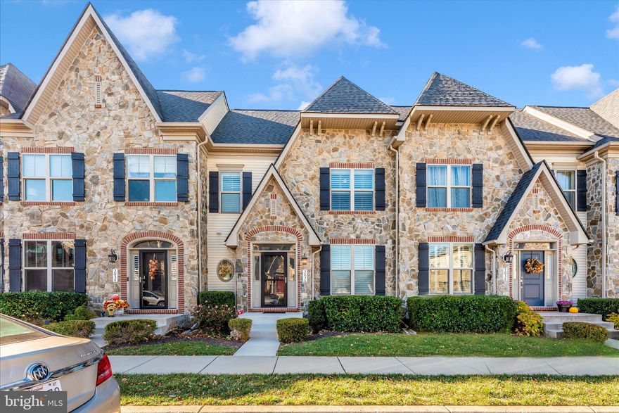 This stunning Chateau Townhouse is loaded with upgrades and ideally located on beautiful Mill Island in the sought-after Worman’s Mill community, known for its exceptional amenities. Repainted in 2020 and lightly used as a second home since then, this residence shows like new throughout.

The main level features beautiful hardwood floors and offers a gracious living room, formal dining room, and a gourmet kitchen with a large island and seating, breakfast area, and a spacious family room highlighted by a striking gas fireplace. Hardwood flooring continues up the stairs and into the primary suite. Step outside to the backyard with a large paver patio leading to the detached two-car garage.

Upstairs, the luxurious primary suite includes a spa-like bath with a large walk-in shower, freestanding soaking tub, and two generous closets with custom organizer systems. Two additional bedrooms, a full bath, and a convenient upstairs laundry room with extra storage complete this level.
The lower level offers a huge finished recreation room, a large storage area, and a rough-in for an additional bathroom, providing excellent future flexibility.
Enjoy the Worman’s Mill lifestyle—walk your kayak down the Blue Bell Trail for direct access to the Monocacy River, stroll past picturesque fountains and ponds, Walk or Run on the trails in nature,  relax at the gazebo with live music and picnics, or dine at one of the many neighborhood restaurants. All of this, just minutes from extensive shopping and everyday conveniences.