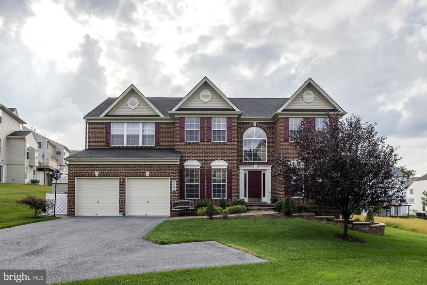 Stately Colonial with designer inspired detailed throughout! Two-Story Foyer; gleaming hdwd flrs; Dual-entry stairs; Formal LR&DR will decorative molding. Gourmet KIT with center-isl & brkfst-bar. Sunroom for entertaining. Fam-rm w/gas FP. MBD w/lux bath, walk-in, & sitting-rm. LL Rec-rm with opt-BR, FB & walk-out to Patio. Welcome Home!