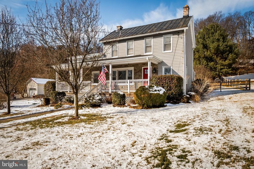 Welcome home to this enchanting, fully renovated farmhouse dating back to the 1900's, where historic charm meets modern living. Renovated from top to bottom just a few years ago, this home sits on just shy of an acre with a fully fenced yard backing to tranquil woods—offering privacy, space, and timeless appeal.

Inside, you’ll find original brick wall accents, sliding barn doors, granite countertops, stainless steel appliances, and a warm pellet stove that anchors the living room—perfect for cozy evenings. The inviting front porch sets the scene for slow mornings and evening views.

The home features three bedrooms, including two on the main level with a full bath, plus a private upstairs bedroom with its own full bath—ideal for guests or a peaceful retreat. Additional improvements include a waterproofed basement with new sump pump (2018) and a new water heater and pressure tank (2026).

Located in the highly sought-after Hereford School District (Blue Ribbon Schools), this charming farmhouse offers the perfect balance of country living with convenient access to Rt. 30, Falls Rd, and I-83.