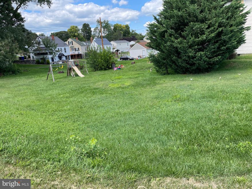 Prime Corner Lot with High Visibility and Versatile Access!
Discover this expansive corner lot, offering excellent visibility and multiple access points from the front, side, and rear. This spacious parcel provides ample room for your dream home, with the added benefit of being able to build a garage in the back. The rear access allows convenient parking and easy entry to your garage from the valley behind the property.
The location is ideal, with proximity to major interstates such as I-81 and I-70, making commuting a breeze. You'll also enjoy the convenience of nearby shopping centers and a variety of restaurants. Essential utilities are readily available, including public water, electricity, and natural gas.
This property presents a fantastic opportunity for a new, economical home that you can enjoy for years to come. For more information or to address any questions, please feel free to reach out.