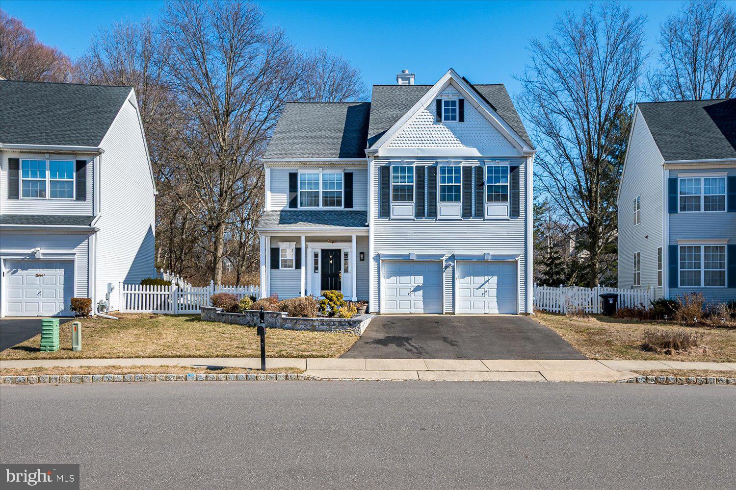 Best offers are due by 03-05-2025 at 7pm. Northwest Facing! The wait is over! Welcome to this fully upgraded home, from a custom designed remodeled 2 full bathrooms and 1 half bath to upgraded kitchen with 42 inch cabinets, center island, backsplash, ceramic tiles, granite countertops and all stainless steel appliances. Home is filled with natural light. The home offers Brazilian cherry hardwood flooring throughout the first and second floor, 2 story family room with wood burning fireplace, ceiling fans, lighting fixtures, a beautiful brick patio with a vinyl fence (2021) for a private backyard. EV Charger, Newer Washer, Dryer & Roof, (Driveway 2024), (Master Bathroom 2024), (Gutters 2024), (Water Heater 2023), (Front Brick Hardscape 2023) and so much more! It is located in the desirable Princeton Crossing Development, with 4 bedrooms, 2.5 bathrooms, and a fully finished basement. The excellent West Windsor Plainsboro School District school system and the community make it a great area for New Homeowners. It is conveniently located with easy access to major highways Rt 1, RT 130, Princeton Junction Train Station, NJ TPK Exit 8A, NY Transit Park & Ride, and only steps away from multiple shopping centers.