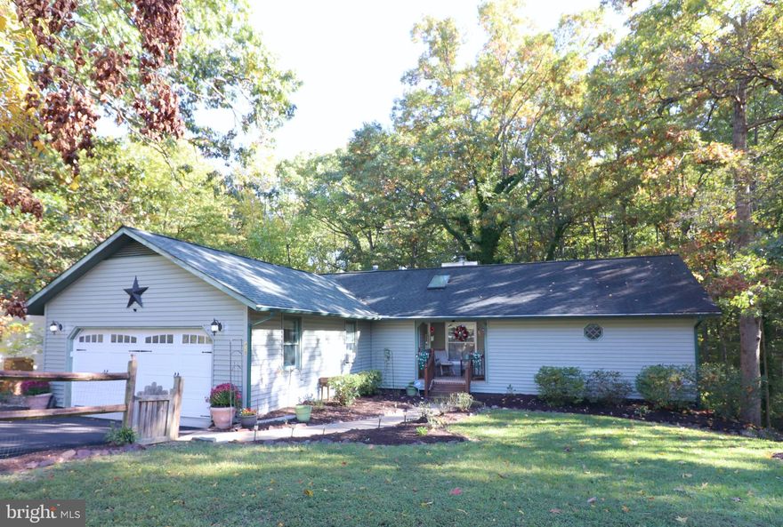 A great place to call home, you need to come see it to appreciate what this home has to offer.   Main level has a spacious living area, 3 bedrooms, and 2 full bathrooms. A finished basement with lots of possibilities has new paint and carpet. Access the rear upper deck over looking private wooded space from either the living room or the master bedroom.  Desirable neighborhood conveniently located to downtown, shopping, hospital, public schools, private school, and private swim club.  VRE users, easily go to either Fredericksburg or Spotsylvania stations. Ask about help with down payment and closing costs.