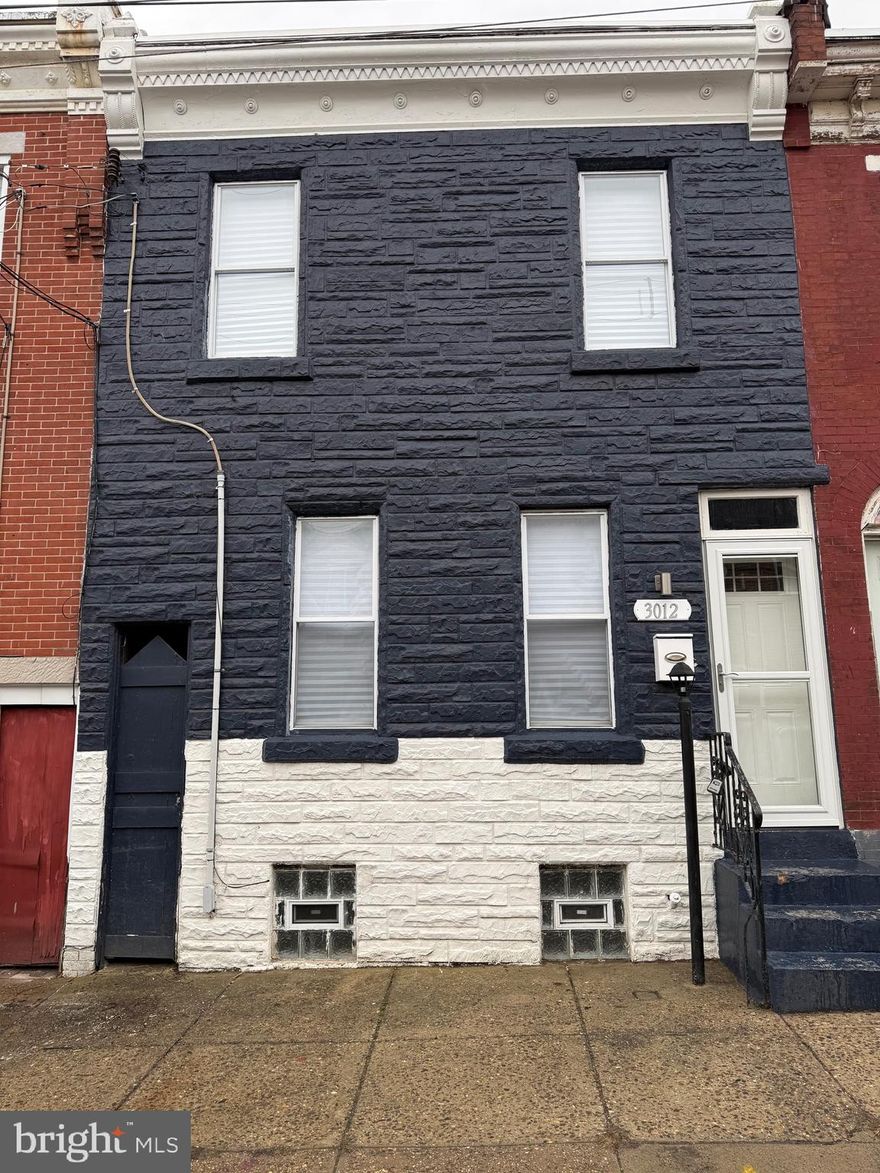Welcome to 3012 D Street, a traditional Philadelphia rowhome located in the Kensington section of the city. This property offers 5 bedrooms & 3 full bathrooms.  A classic layout with defined living and dining spaces and a functional floor plan that provides flexibility for a variety of uses.
The home presents a solid opportunity for a buyer looking to personalize, whether for owner-occupancy or as an investment property. With well-sized rooms and a straightforward interior design.

Conveniently situated near major roadways, public transportation, shopping, and neighborhood amenities, this location offers accessibility throughout Philadelphia. Ongoing activity and redevelopment in surrounding areas add to the long-term potential of the property.