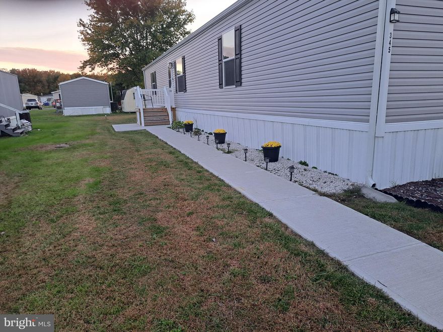 Welcome To Pinewood Acres....This Is A  Beautiful & Immaculately Well Kept Home.  Purchased New In 2024 From Clayton Homes With All Updated/Modern Systems And Appliances.  The Home Presents With 3 Nice Sized Bedrooms, 2 Full Baths With Private Master Bath.  Comes With  An Exceptionally  Gorgeous Kitchen Including A Nice Island  And All New Stainless Steel Appliances.  Upon Entrance, The Layout   Flows  Seamlessly Throughout And Is Very Tastefully Decorated With Pride Of Ownership Showing.  The Entire Home Has High Quality Maintenance Free Flooring, And Plenty Of Natural Light.  Location...Location....Location...This Development Is Close To Shopping, Dining, All Delaware Beaches And  Waterfronts As Well As Ocean City.     Put This One On Your List To Tour !!