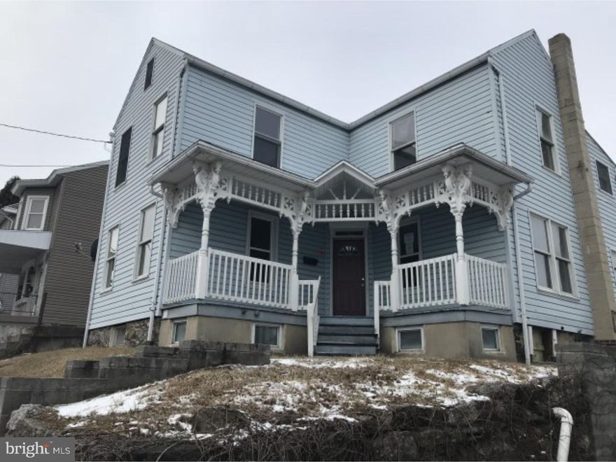 Fixer Upper!  Could be a big beautiful house again.  Located on a corner lot, this home features a fenced yard, potential off street parking, spacious bedrooms, and two full baths.  Work needed, but great investment for rental or a flip.