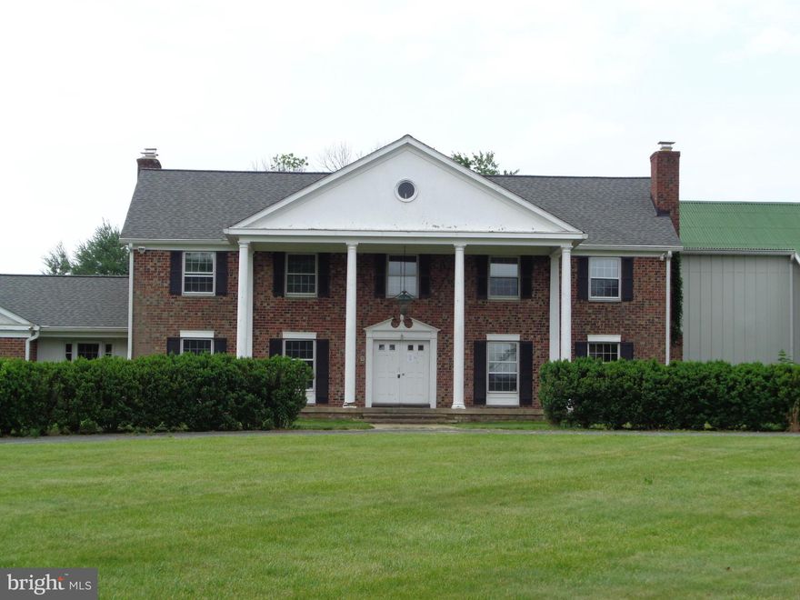 ***Price Reduced***Grand home awaiting new owners! A 68 x 24 ft addition that was once a former dance studio has room for formal parties and receptions.  6 bedrooms 5 bathroom and plenty of space for parking. Gourmet /commercial kitchen already in place! 3.77 acres-Over 7000 sq ft.of living space.