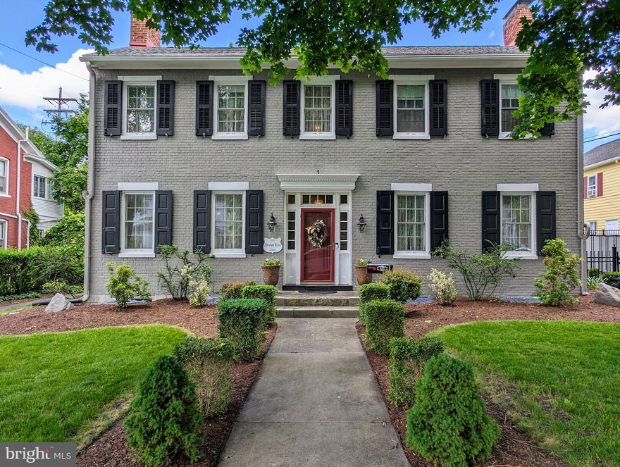 Breathtaking Colonial Home in Historic Bedford. So many things to appreciate in this lovely brick home .Sellers have remodeled and made so many updates. New kitchen with top of the line appliances, quartz countertops, center island, opens to the inviting family room . Formal front living room and formal dining room . Bonus gathering room in the back and a newly completed mudroom. Main level also has a half bath . Front and back staircases lead upstairs , full bath in rear with 2 bedrooms, one is currently being used as a craft/sewing room. Up the front staircase leads to the primary bedroom , 2nd bedroom , 3rd bedroom has been converted into every women's dream a'' Hollywood'' closest. Bathroom newly remodeled and laundry area relocated upstairs. Also a door from second floor to a newly rebuilt upper porch area that overlooks the courtyard. Speaking of courtyards , this one will have you doing a double take. covered hot tub area surrounded by lush turf, also a breathtaking waterfall . Fenced area off the back door with a cement patio, Summer kitchen in the courtyard that has a first and second level. Seller has been using it as his office, it is just adorable. Yard extends to the back alley where there is off street parking and a detached garage. Must tour to appreciate. OPEN HOUSE BEING HELD SAT MAY 25th from 10:30- 12:00.