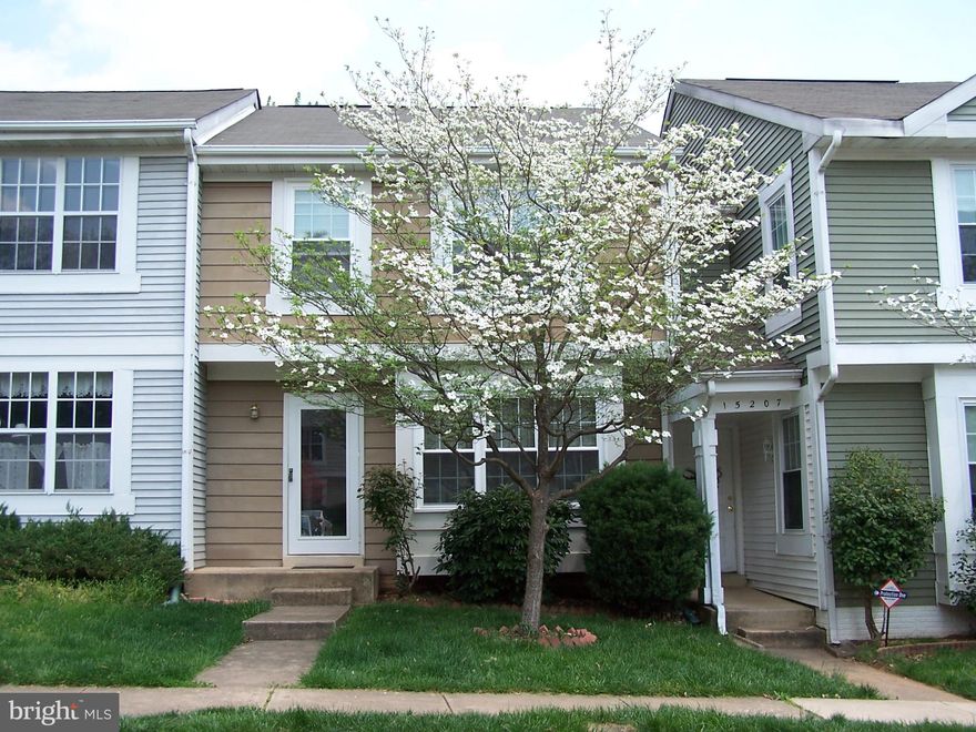 Don't miss this beautiful townhome in sought after Montclair. The unit features three fully finished levels with a walk-out basement that leads to patio. Large deck with stairs goes down to fenced rear yard backing to common area. Inside you will find spacious rooms, vaulted ceilings in the primary bedroom, hardwood floors, built in shelves, wood stove in living room for those cool fall/winter evenings.  Enjoy of the amenities Montclair has to offer, there is a path to lake in the community.  Hurry, This one will not last! Photos from Previous listing! Current tenant has a lot of stuff!! There is a small dog at the property that is friendly and will bark! Not known to bite!