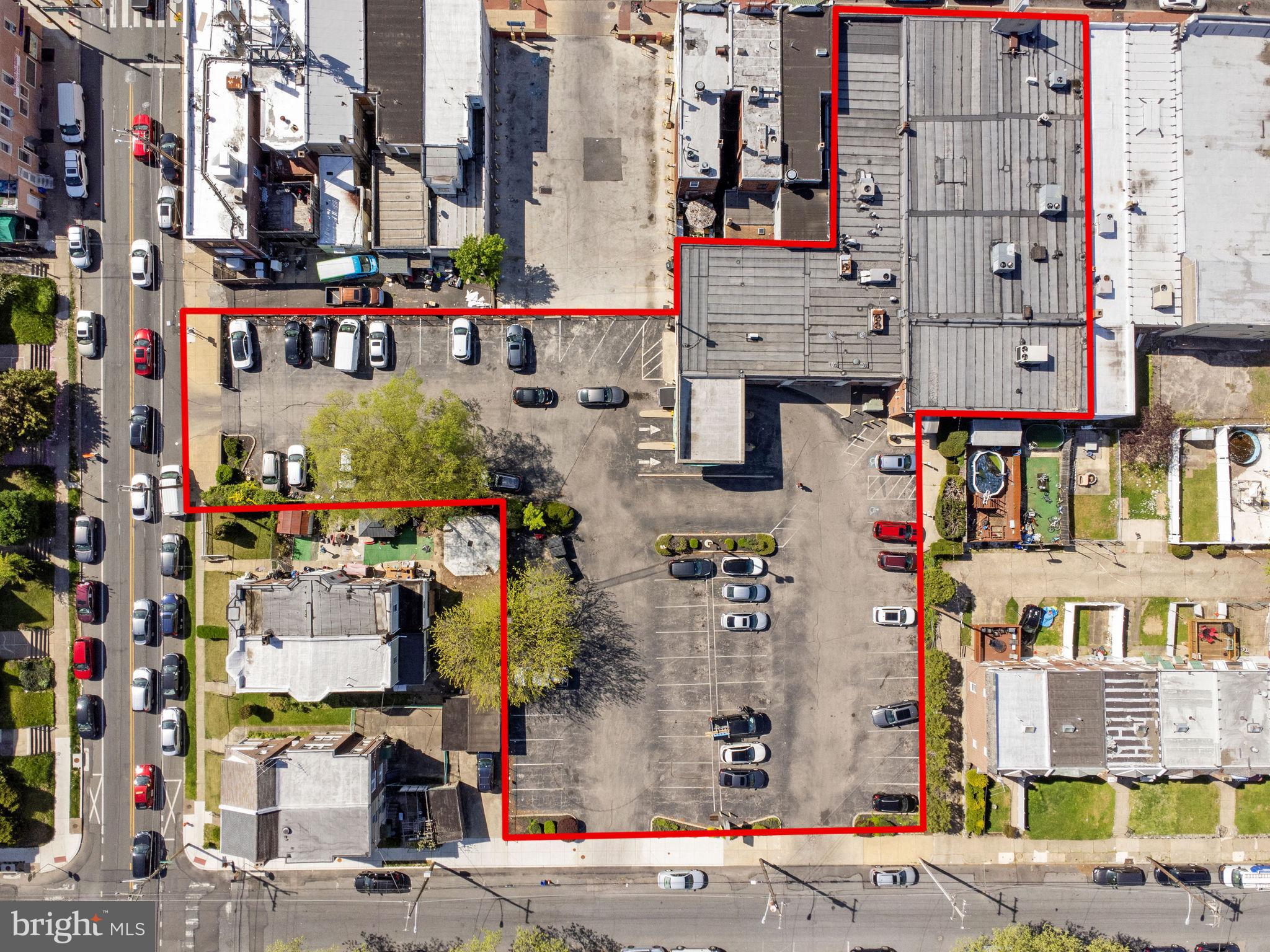 Great Opportunity for an investor and an owner to occupy this 11,629 square feet with a finished basement of 3471 square feet located on 6423-25 Rising Sun Ave. The bank has both entrances from Rising Sun Ave and a parking lot with a large open corridor, lobby, waiting area, personal banker cubicles, reception, meeting room, teller vault, safe deposit vault, men + ladies bathroom, 2-private executive office with bath, lunch room, 2 large conference room with plenty of storage rooms. The adult care center has both entrances large lobby, 4 private offices, a large conference room in the back with a kitchenette, a work room, and 4 bathrooms. The finished basement has 5 large office rooms, 2 baths, a kitchenette, utility rooms, and plenty of storage spaces. There are sprinkler systems in the building, the new roof was installed in April 2024 and the adult care was renovated a few years ago. There are 6 rooftop HVAC Units and 3 were installed after 2017. There are large signages in the front and the back street. Currently, both tenants Bank of America's 7,398 sf and the Adult Care center's 4231 square feet are occupying. This sale included 2 additional lots currently 75 parking spaces 6410-20 Parlmetto Street #885681300 and 6422 Palmetto Street # 885682140. The parking lots are shared between both tenants now and the bank does have a drive-thru in the back. Both front entrances are on Rising Sun Ave and the parking entrance and exit are on Levick Street and Palmetto Street. Conveniently located on this busy Rising Sun Ave in the most desirable Northeast Philadelphia, Minutes to Montgomery County, Center City. Also, the building is for lease at $22.00 per square foot. The buyer and agent must check the size and zoning. All showing must send POF before showing.