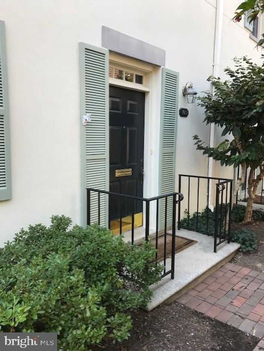 Location! Minutes to DC, near bike path. Spacious quiet end unit townhome on interior of manicured courtyard in Old Town Alexandria.  3BR, 2 1/2 baths, underground parking space, galley kitchen, marble countertops, hardwoods throughout.  DR w/step down to spacious LR w/FP.