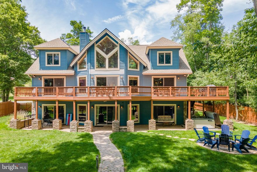 Gorgeous Lakefront Craftsman on Deep Creek Lake - This 7Bed 5.5Bath home has been meticulously maintained and is nestled on a private cove featuring a manicured level lakefront and personal Type A Dock! From the three bedroom suites, to the large deck overlooking the backyard with stunning lake views, you’ll find that this is the mountain lake getaway you’ve been looking for! All three levels are full of amenities for everyone. An Established Rental, “Paradise at Deep Creek” is located off the beaten path from any seasonal traffic, but still minutes from the best restaurants, state parks and Wisp Resort. Don’t miss out on this incredible opportunity.  Call today for details!