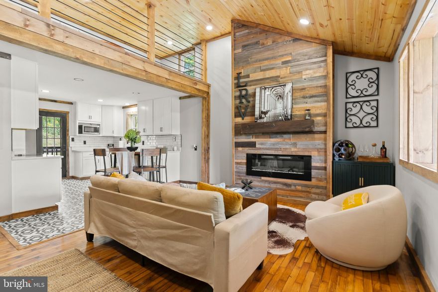 Discover your ideal retreat in Mathias, WV with this beautifully renovated 2-bedroom, 2-bathroom home  nestled on a serene 0.5-acre lot with gorgeous mountain views from the covered front porch. This home masterfully combines rustic charm with contemporary comforts. The open-concept living area is bright and airy, featuring a versatile loft space perfect for a play area or additional guest sleeping. The modern kitchen is a chef's delight, showcasing stainless steel appliances, ample cabinet space, and generous countertops. The spacious main bedroom is bathed in sunlight and includes a convenient en-suite bathroom.  This lovely home is an established and successful AirBNB rental, has all new systems, comes mostly furnished  and includes a Google Nest system. 

Step outside to enjoy the large deck, hot tub and expansive yard with, ideal for both relaxing and entertaining. Picture yourself unwinding on the unique porch swing fire pit, watching fireflies dance in the evening sky. 

As an extra bonus there is a huge basement that would be ideal as a workshop for all those tinkerers out there. The artist and/or craftsman in the family can enjoy a separate and undisturbed space for all of their works-in-progress.

This 1/2 acre property is conveniently located off of a paved road with easy access. There is plenty of space and privacy to create your own outdoor oasis with the hassle of caring for huge acreage.